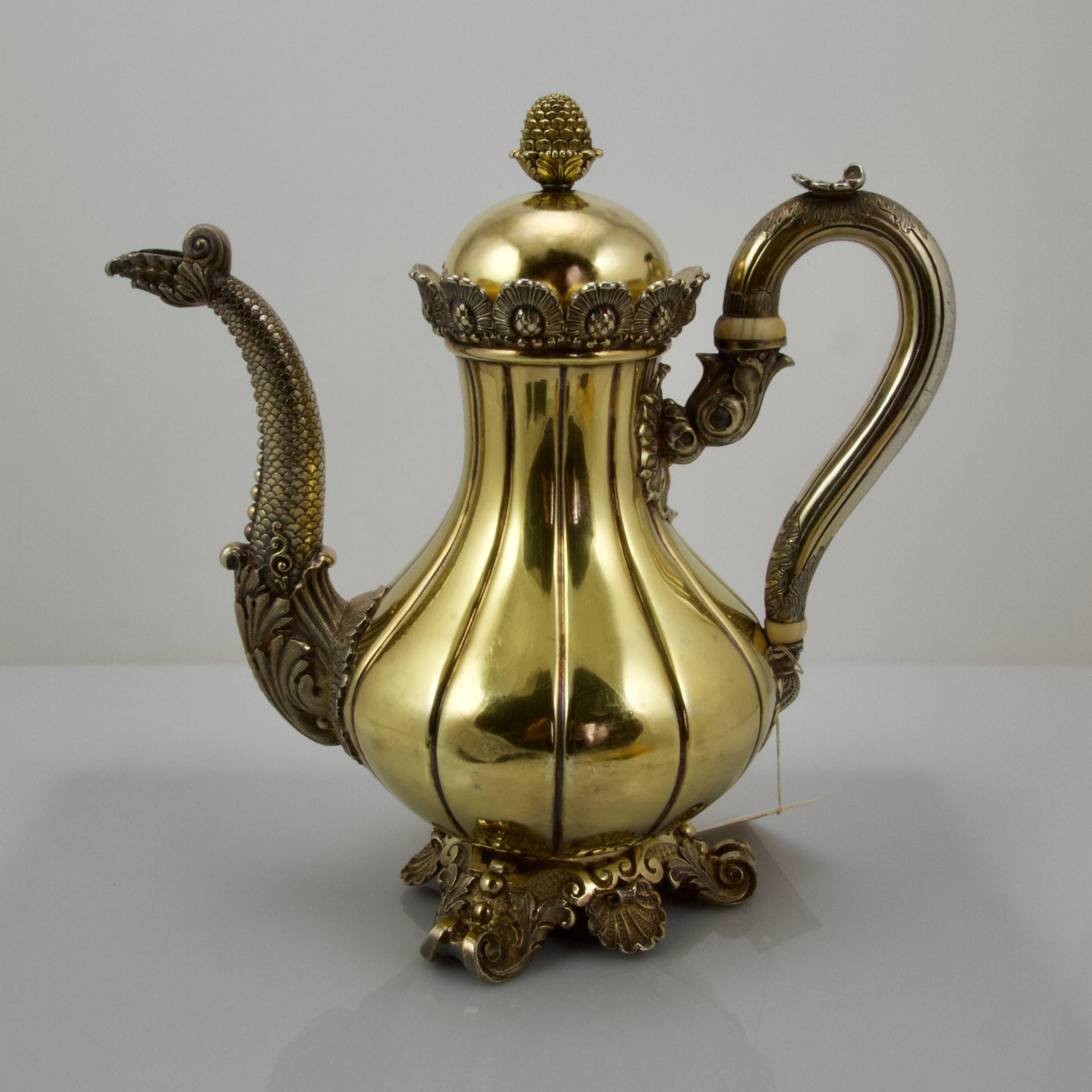 Very perfect quality of work for this coffee-pot. All the element of the silversmith technics for an unusual and oriental style pot. Smooth and matte, lattice on ground, scales, scrolls, shells, pomegranata, pine, dot, acanthus, alls in a very, very