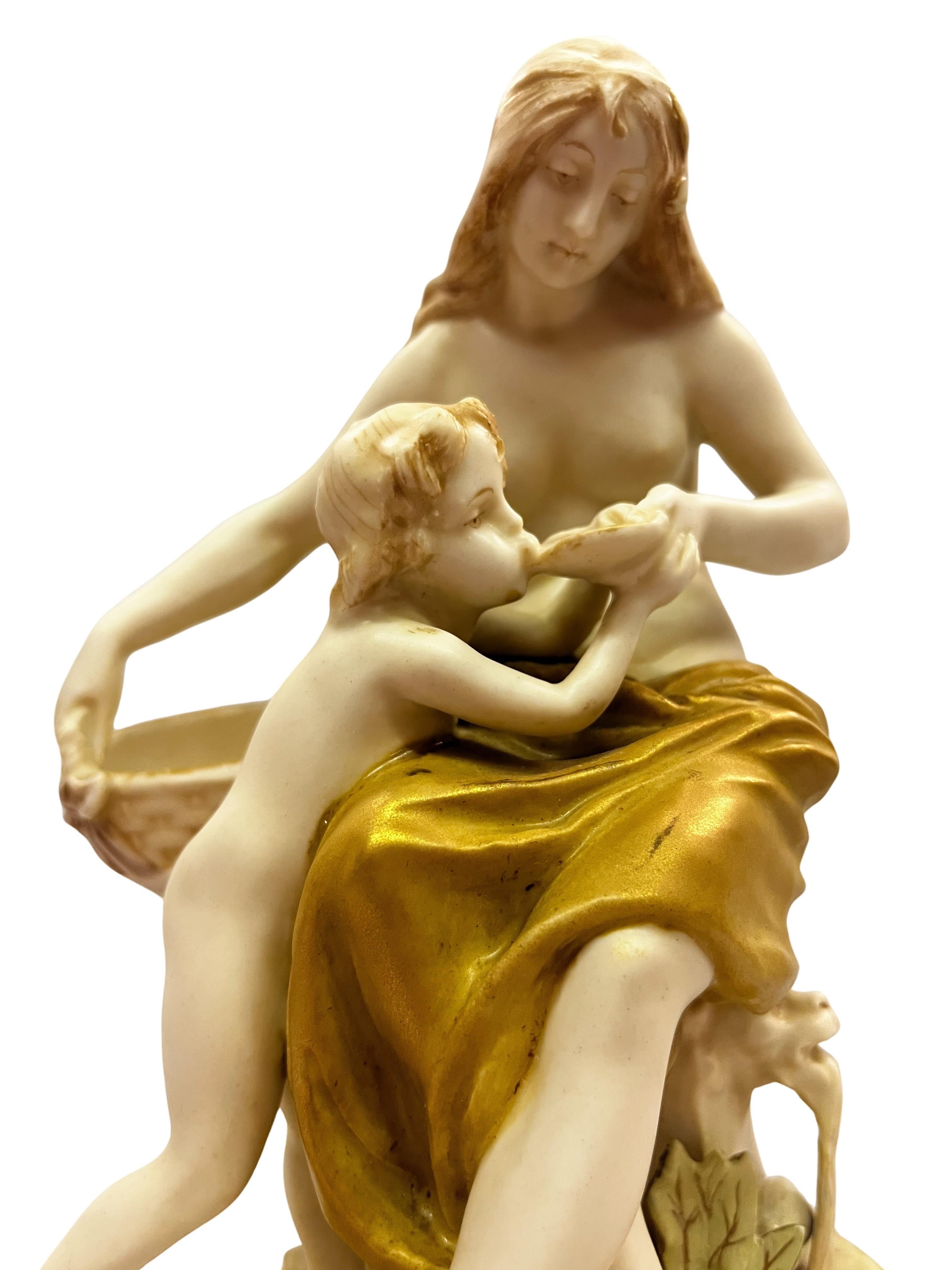 Beautiful porcelain work by Ernst Wahliss, depicting a mother with child, probably Aphrodite with armor, made by Royal Vienna around 1900 in Austria.

This exceptionally rare work is by Ernst Wahliss, the renowned maker of high-quality earthenware
