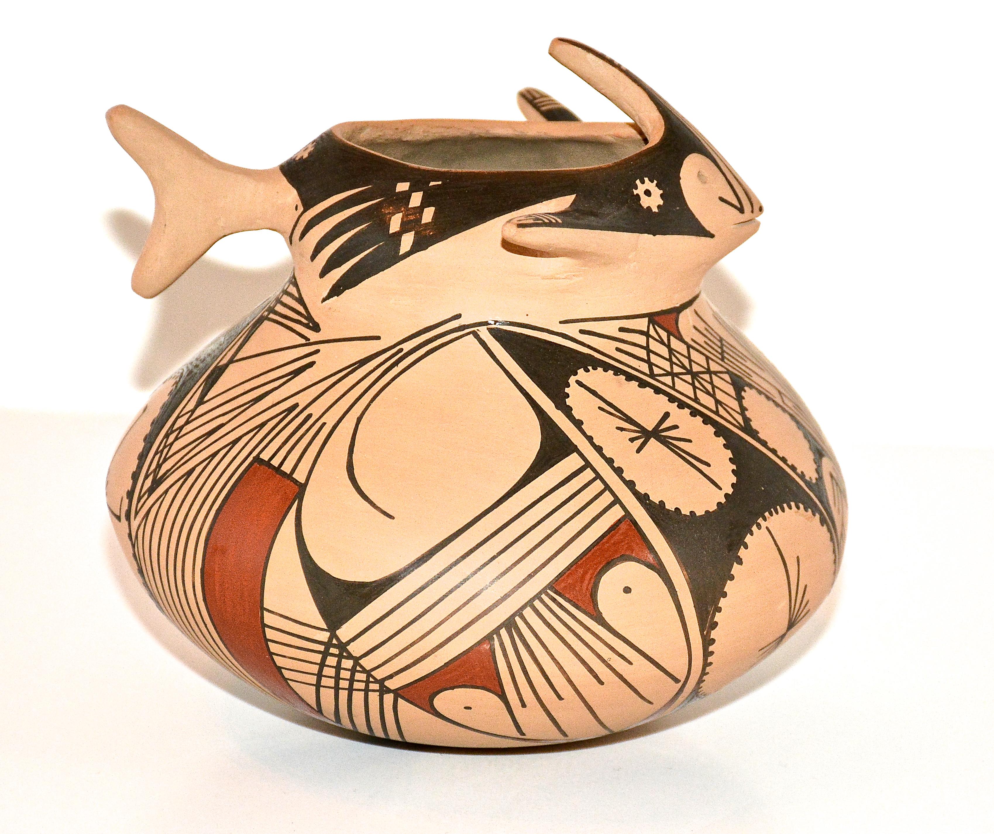 Polychrome effigy pot
Mauro Quezada
Hand coiled low fired clay
1989
Pueblo Quezada, Mata Ortiz, Chihuahua, Mexico
Measures: 4.75 inches height x 5.5 inches in diameter

Mauro Quezada is the nephew of Juan Quezada and an acknowledged Master Potter of