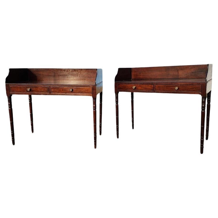 A fine, rare to find matched pair of Boston federal servers / dressing tables with backboard and scrolled sideboards on rectangular tops. The frame has exceptionally well-turned legs and beaded drawers. The rich grained mahogany with original warm