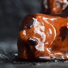 Match Pair of Redware Naïve Pugs, circa 1914