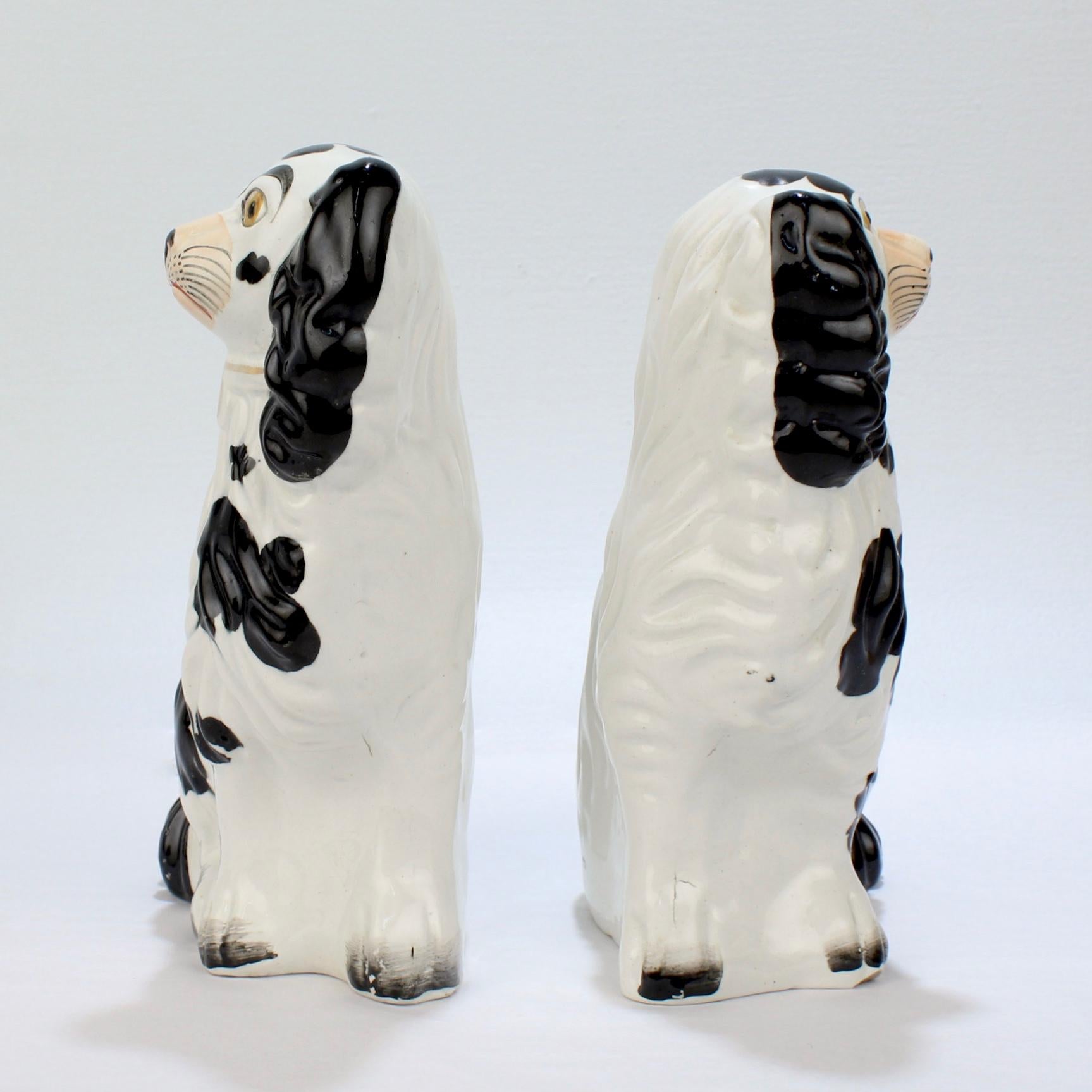 Matched Antique Black and White Staffordshire Pottery Spaniel Dog