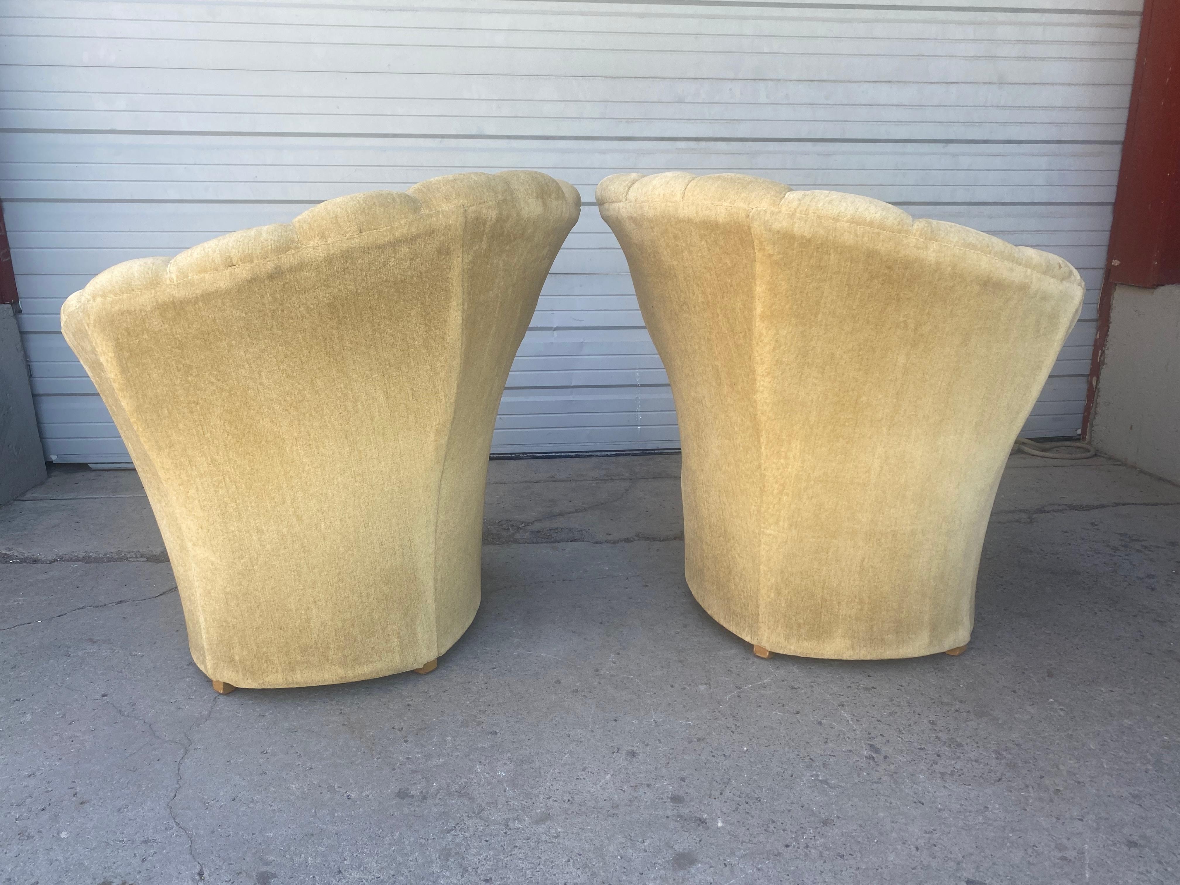 Stunning pair Art deco / regency asymmetrical lounge chairs by Grosfeld House. Amazing design, hollywood glam. Retain original cream color mohair upholstery. Extremely comfortable. Hand delivery avail to New York City or anywhere en route from