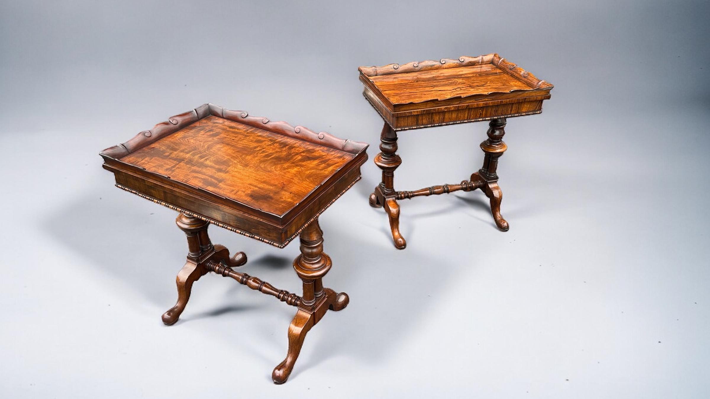 A superb matched pair of Gillows rosewood - mahogany work or end tables.
One table in rosewood the other mahogany.
The rosewood table with solid rosewood turned twin column supports and Georgian style solid rosewood cabriole legs with carved spade