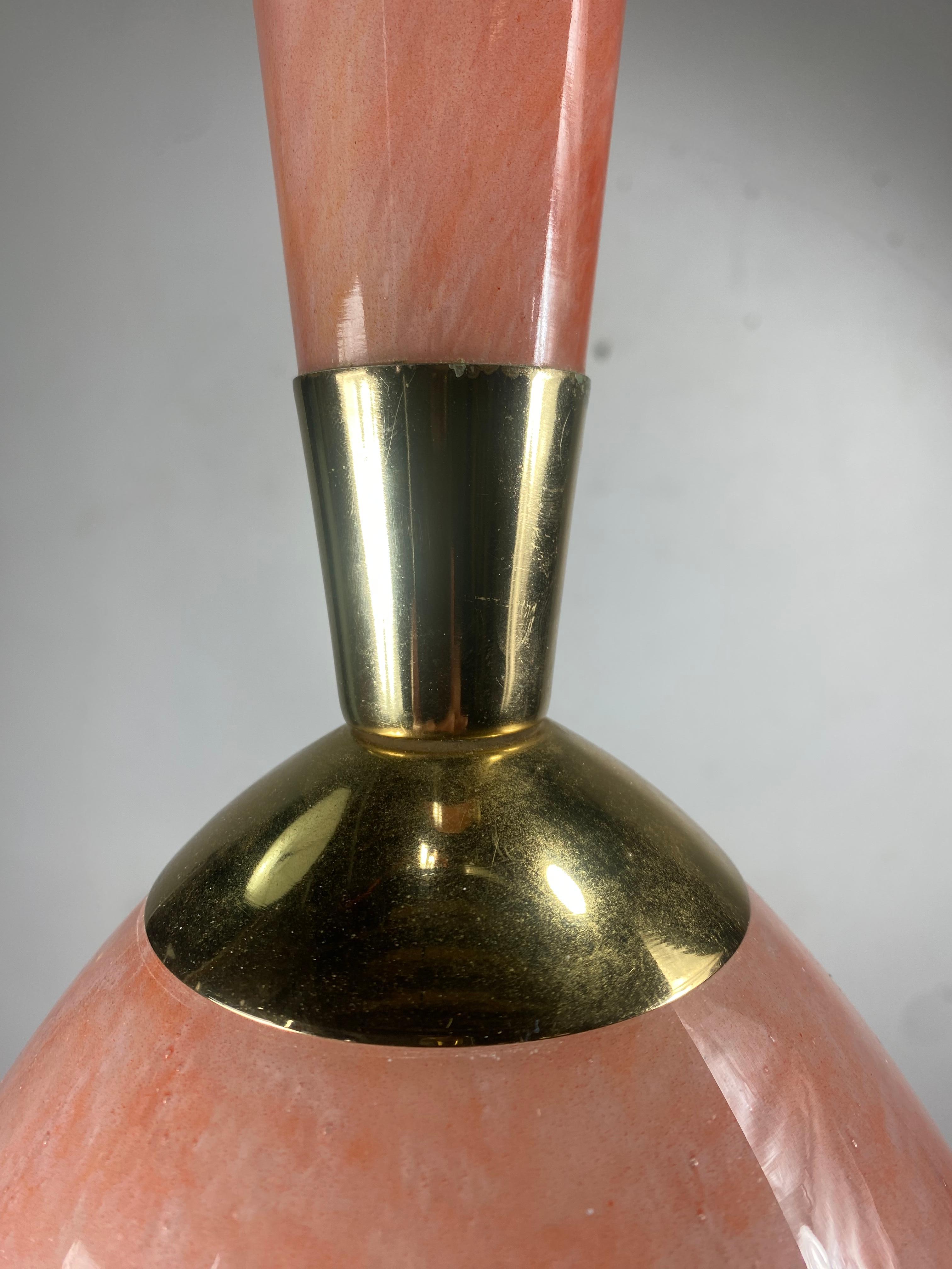 Matched pair hand blown glass and brass modernist pendants by Moe Light. Classic Mid-Century Modern design. Amazing color and form.