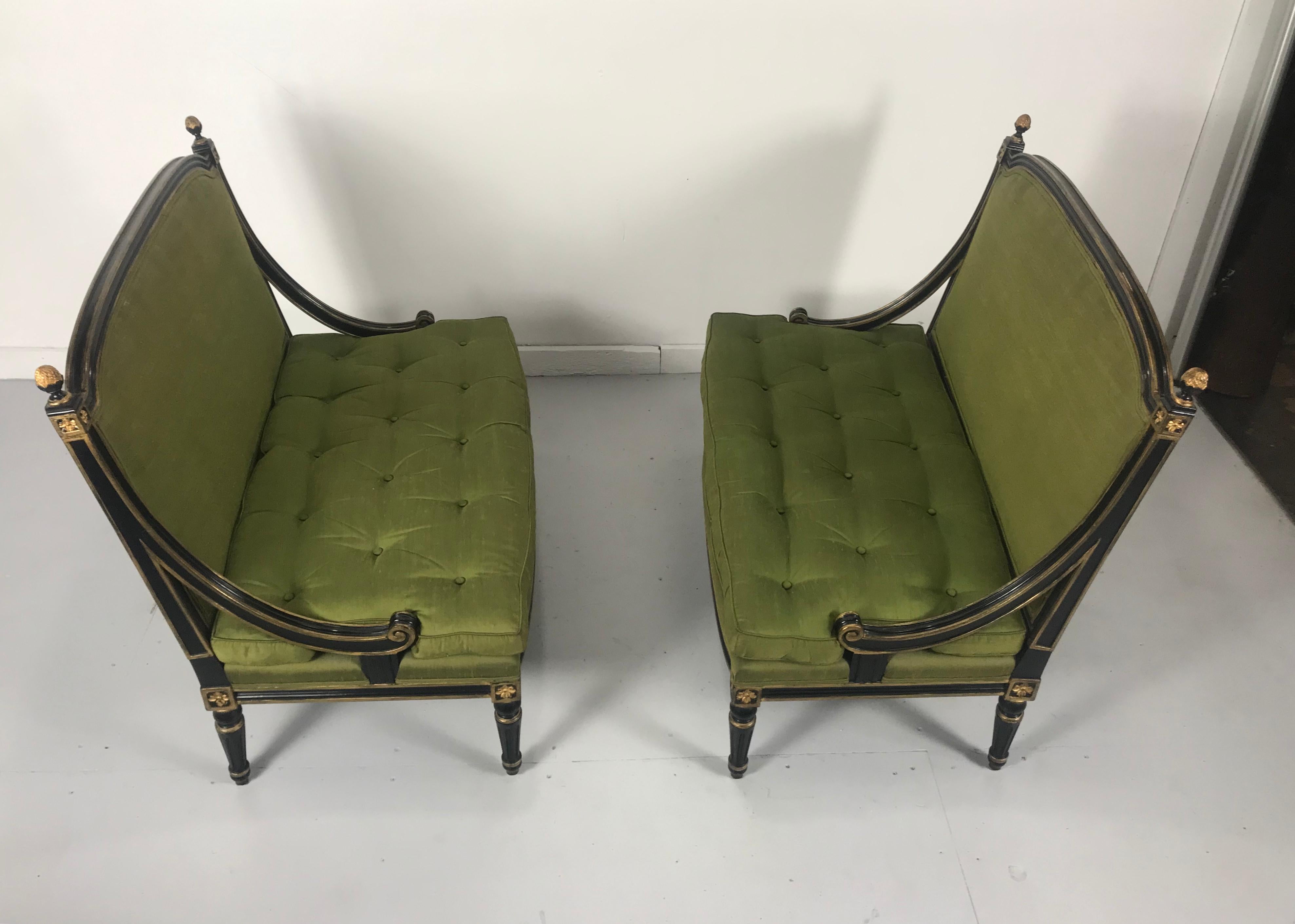 Matched pair Louis XV style Lacquered and gilt Settee's, loveseats, stunning, retain original moss green silk fabric. Superior quality and construction. Attributed to Baker Furniture. Measures: Arm height 15.5.