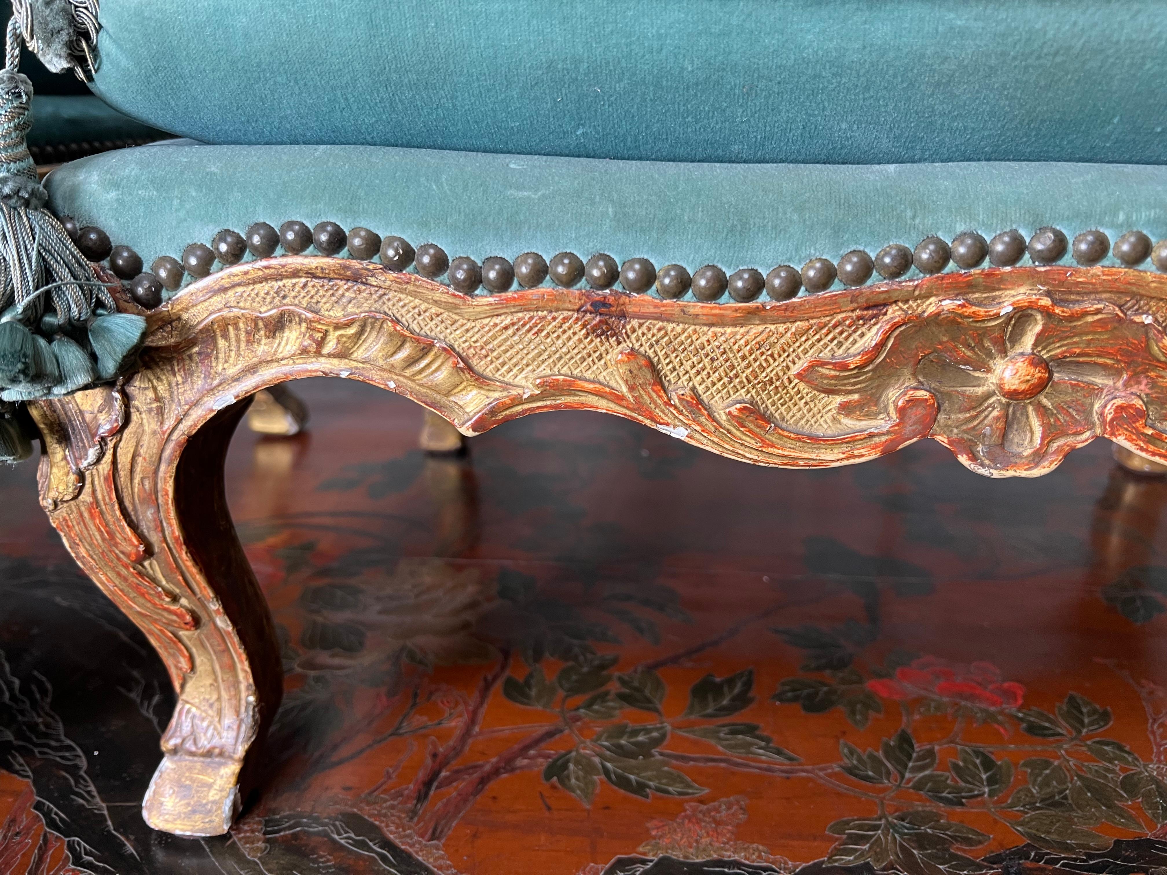 Hand-Carved Matched Pair of 19th Century French Gilt Wood Louis XV Style Footstools
