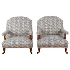 Matched Pair of 19th Century Howard & Sons Open Arm Armchairs