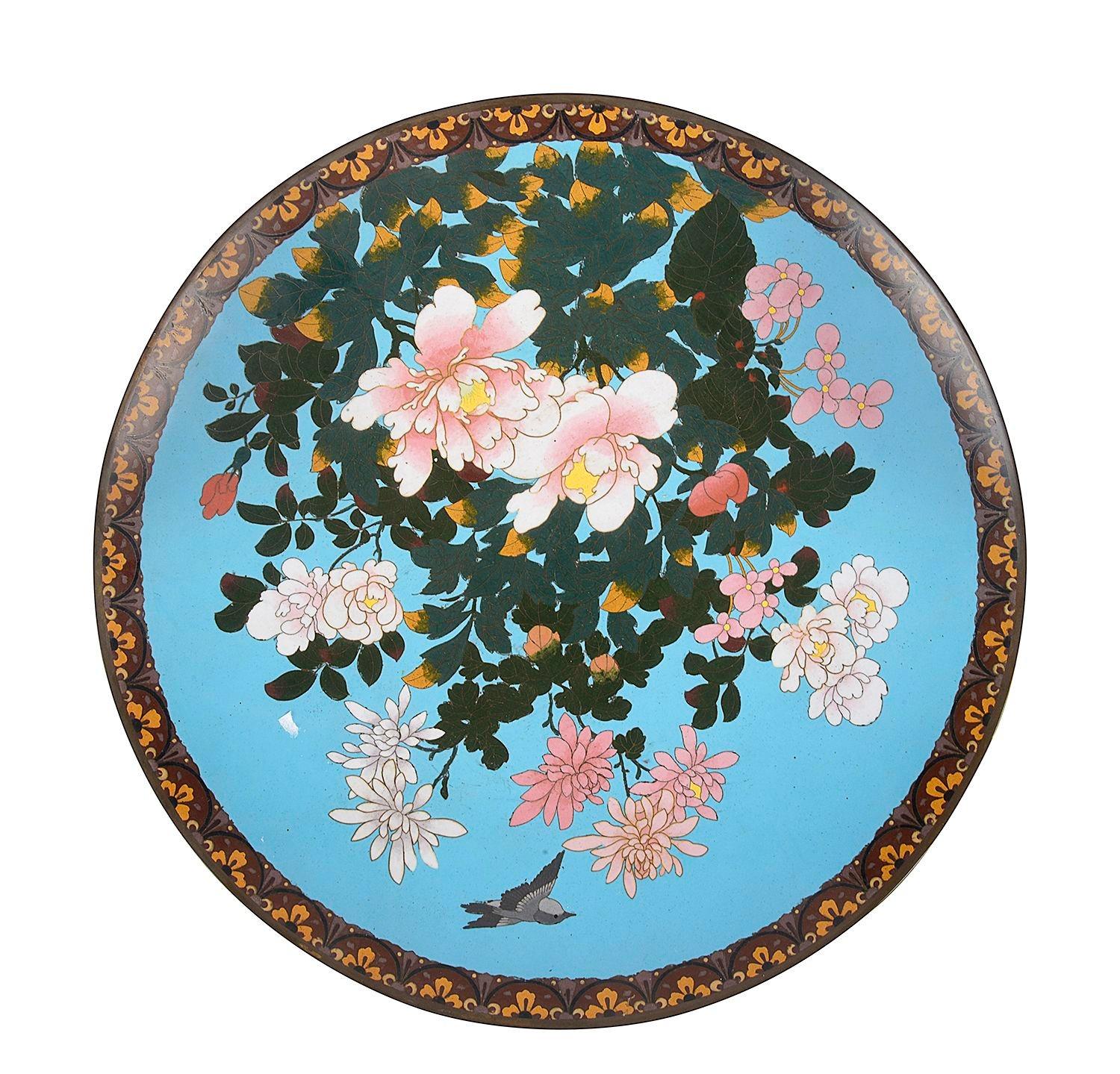 A very good quality and decorative pair of late 19th Century Japanese Cloisonné enamel chargers, each with this wonderful light blue ground, classical motif decoration to the boarders. Birds flying among exotic flowers and foliage.

Batch 76 C/C