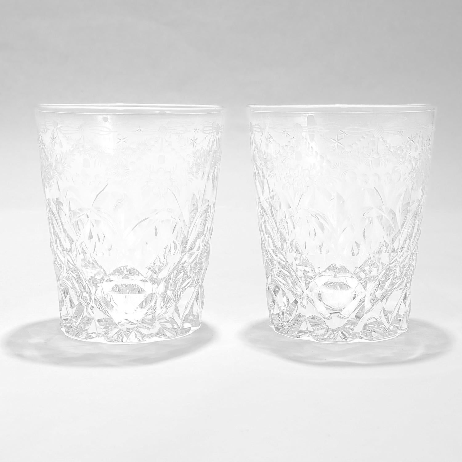 A pair of fine antique cut glass whiskey tumblers.

Each with cut geometric patterns throughout and engraved/frosted garlands and flowers around the circumference of the rim.

Simply a wonderful pair of whiskey glasses!

Date:
20th Century

Overall