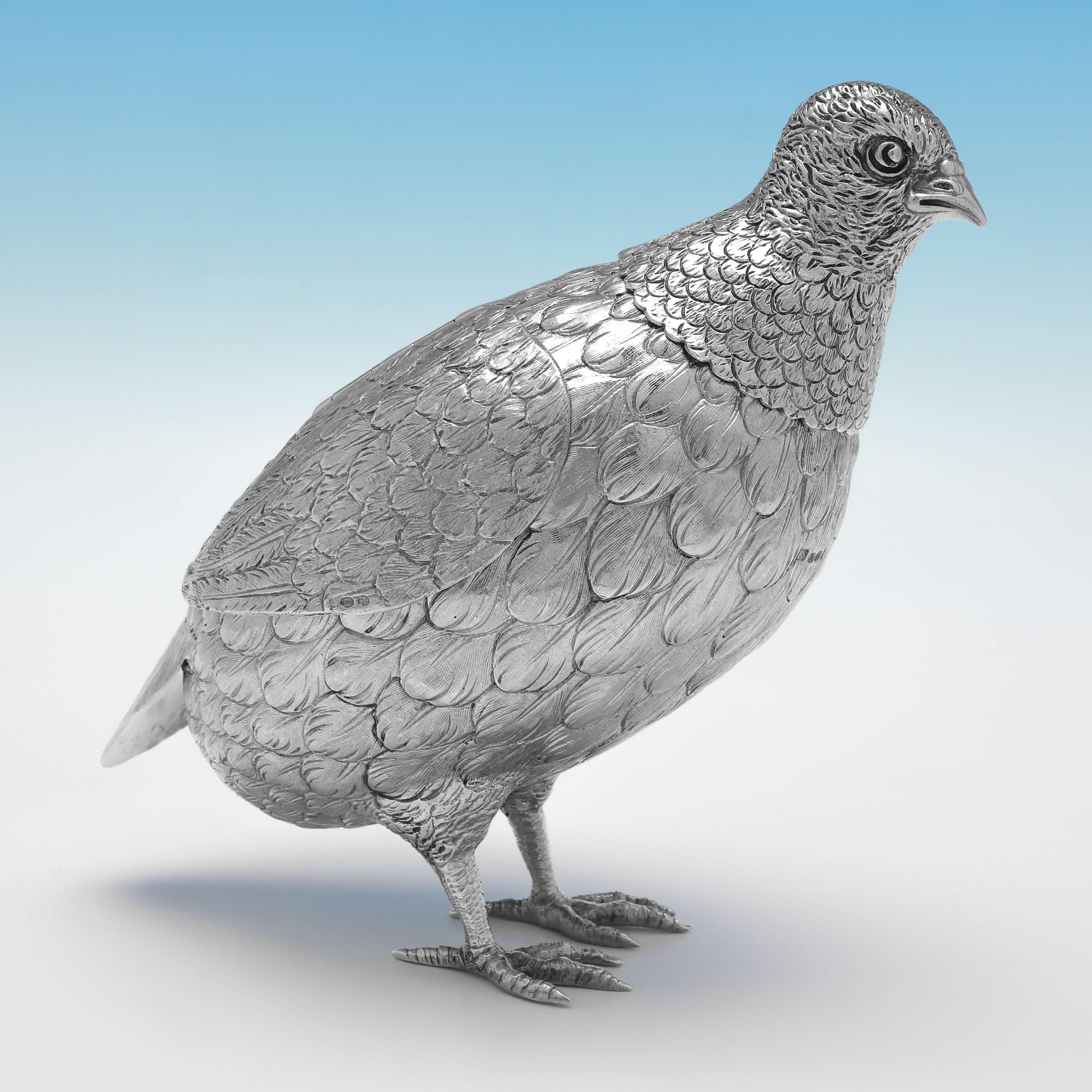 Carrying import marks for London in 1897 by Berthold Muller, and London in 1925 by Israel Segalov, this charming, matched pair of Sterling Silver Models of Partridges, are handsomely made. 

Each partridge measures 6.25