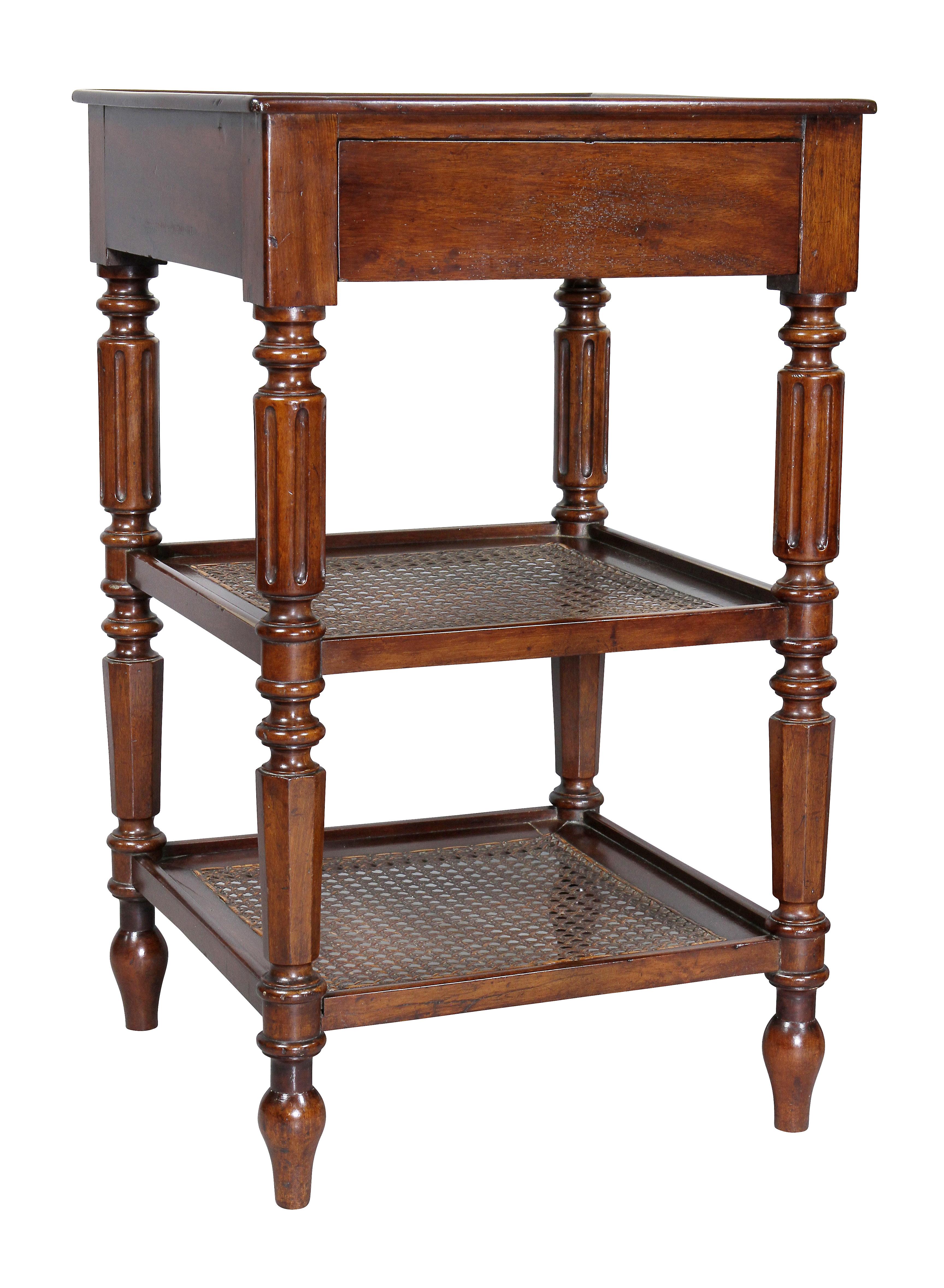 Each with an inset gray and white marble top over a drawer with two lower caned shelves joined by turned reeded legs, toupie feet.