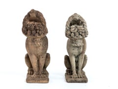 Matched Pair of Composite Stone Dogs with Fruit Baskets, England Mid 20th C.