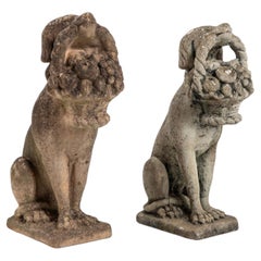 Matched Pair of Composite Stone Dogs with Fruit Baskets, England Mid 20th C.