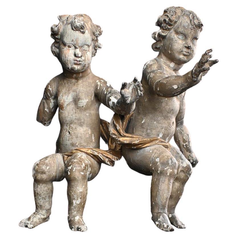 Reproduction Putti Matched Pair of Early 19th Century German Putti Figures at 1stDibs