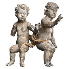 Matched Pair of Early 19th Century German Putti Figures