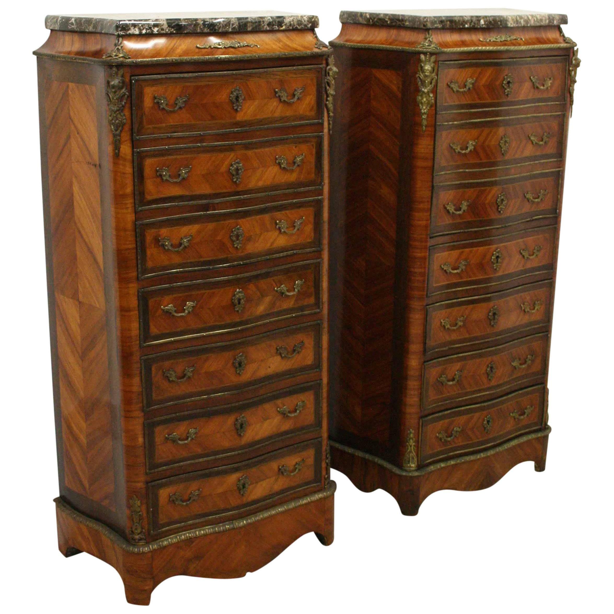 Rare matched pair of French ormolu mounted serpentine secretaire chests, with caryatid mounts, circa 1880. The variegated marble tops above the secretaire drawer and four further serpentine drawers, all standing on an ormolu mounted shaped plinth