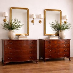 Matched Pair of Georgian Mahogany Serpentine Chests, One Signed Joseph Rawson of