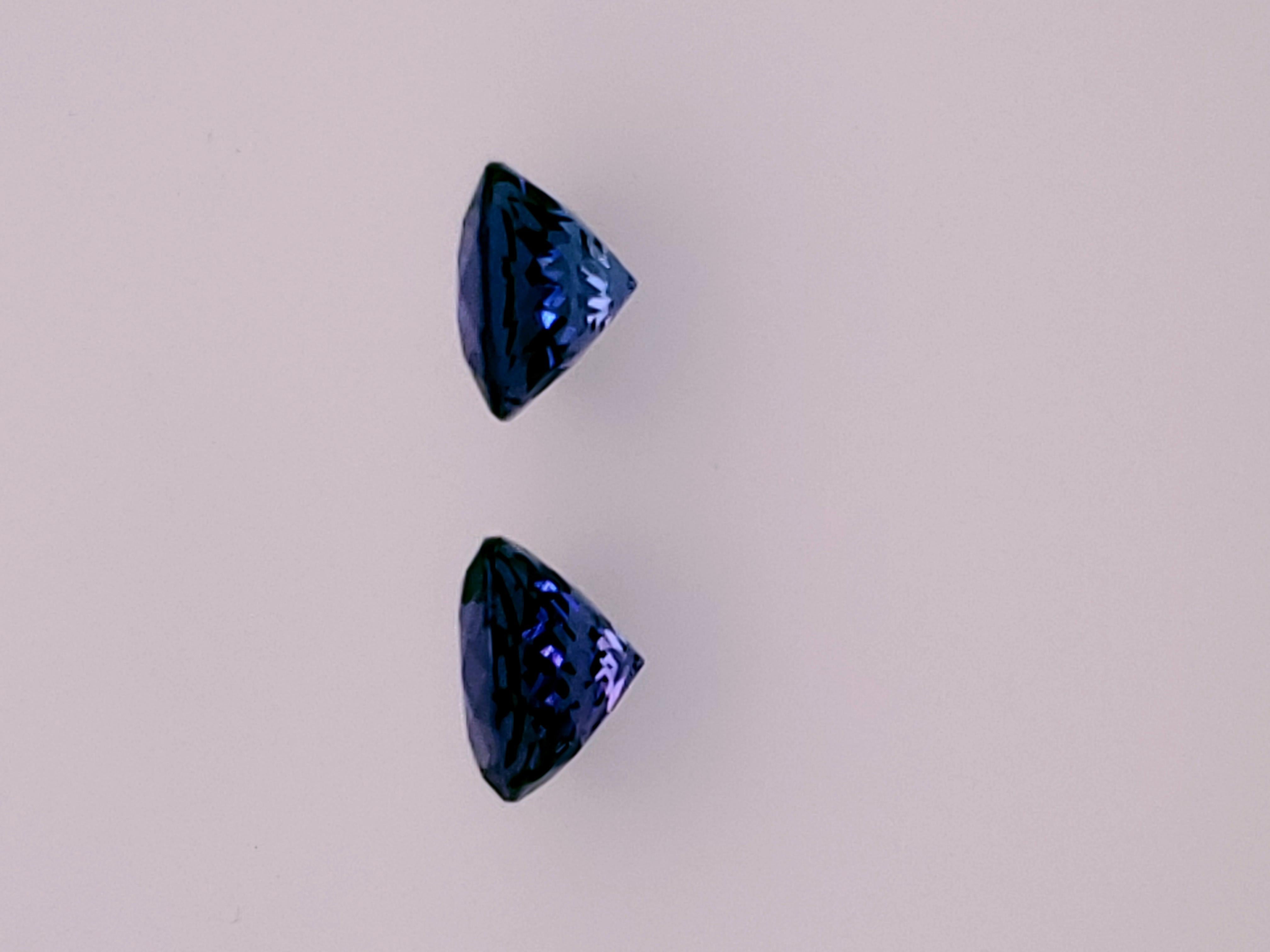 Round Cut  Matched Pair of Glowing Blue 8mm Tanzanites - weighing 4.26ct For Sale