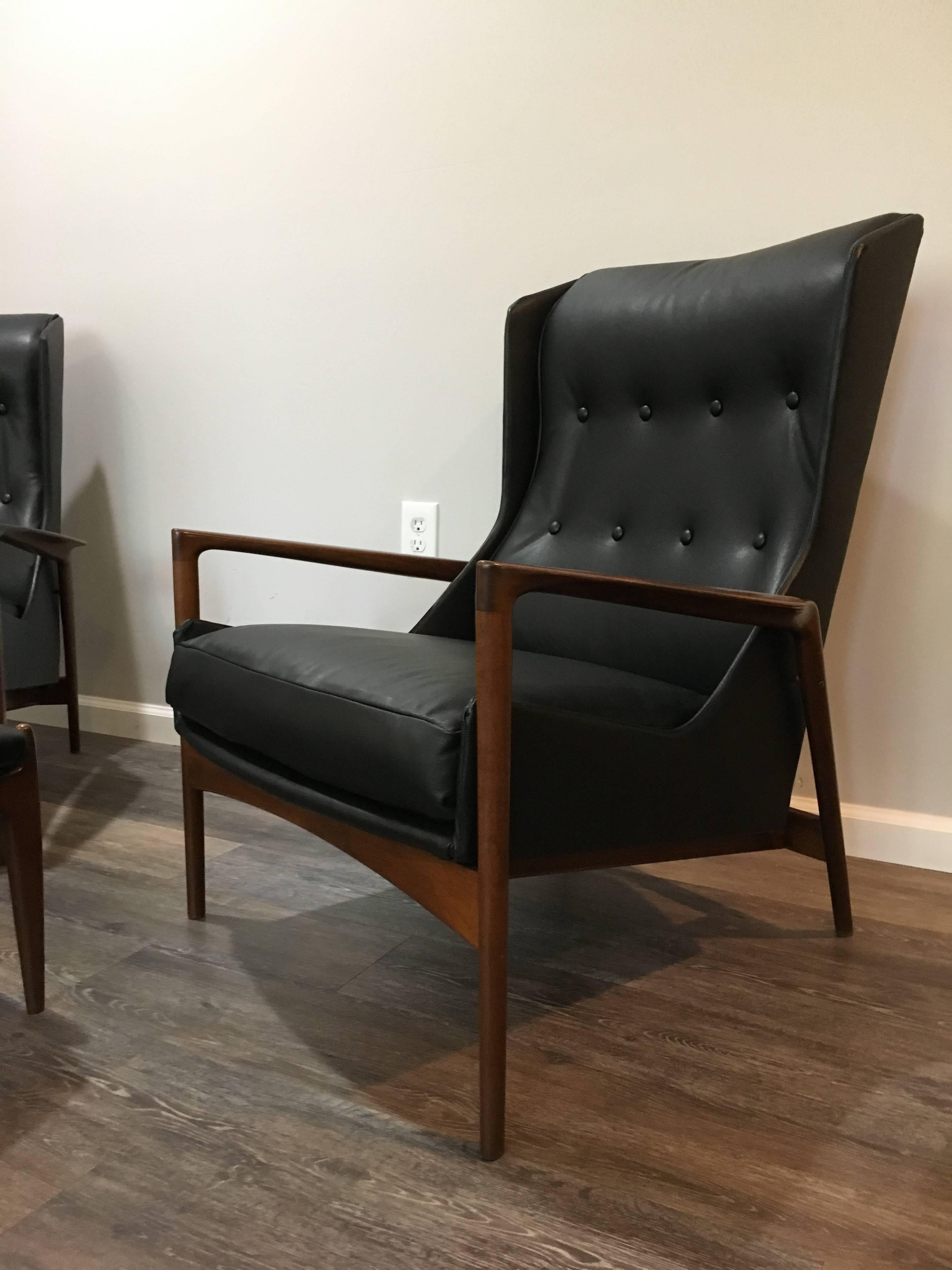Matched Pair of Kofod Larsen Leather Wingback Chairs and Ottoman In Excellent Condition In Southampton, NJ