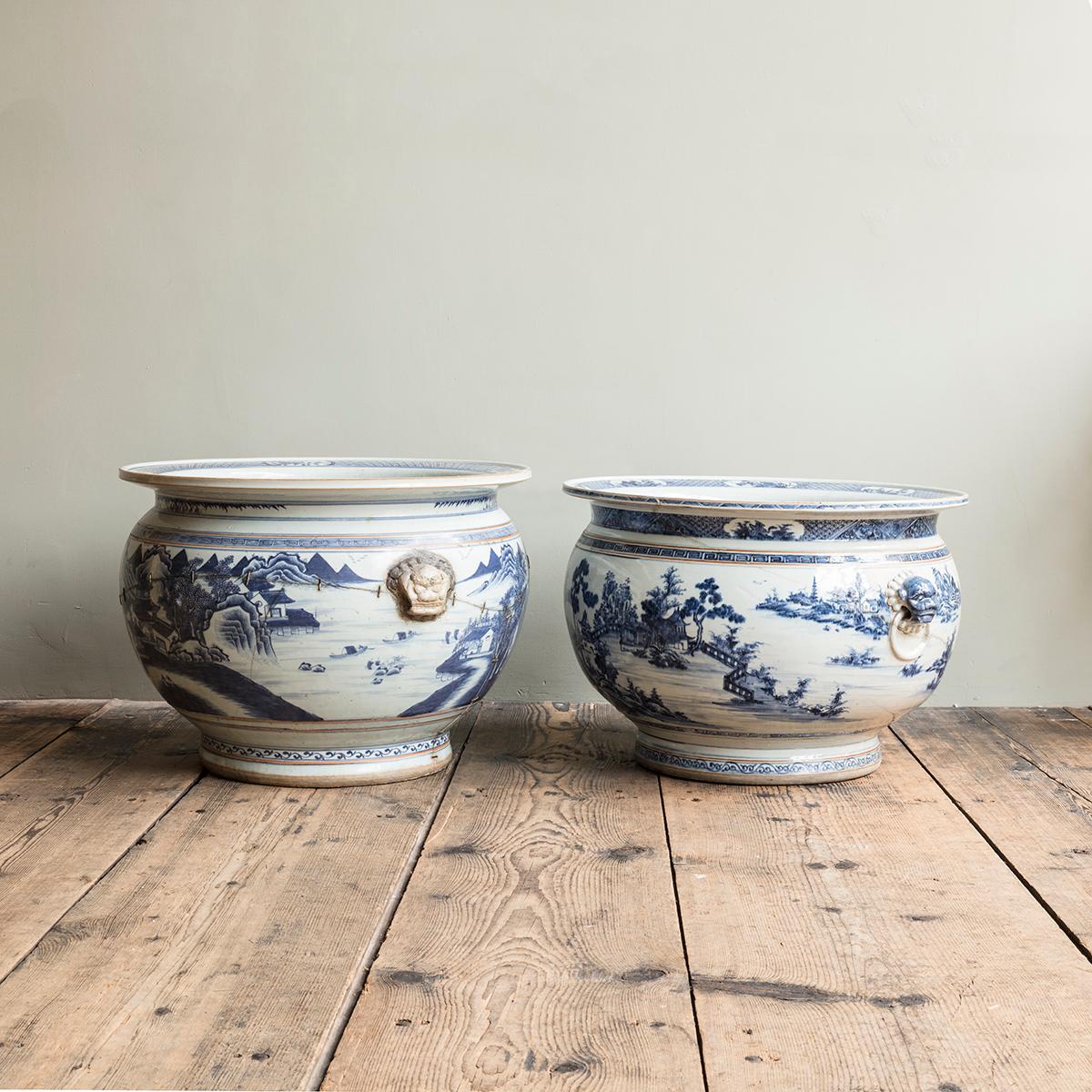 Qianglong period. Each with circular rim, decorated with mountainous landscape and water scenes, within trellis and foliate borders. The overall decoration interspersed with flowering blossom and branches, traditional dwellings, and extensive rocky