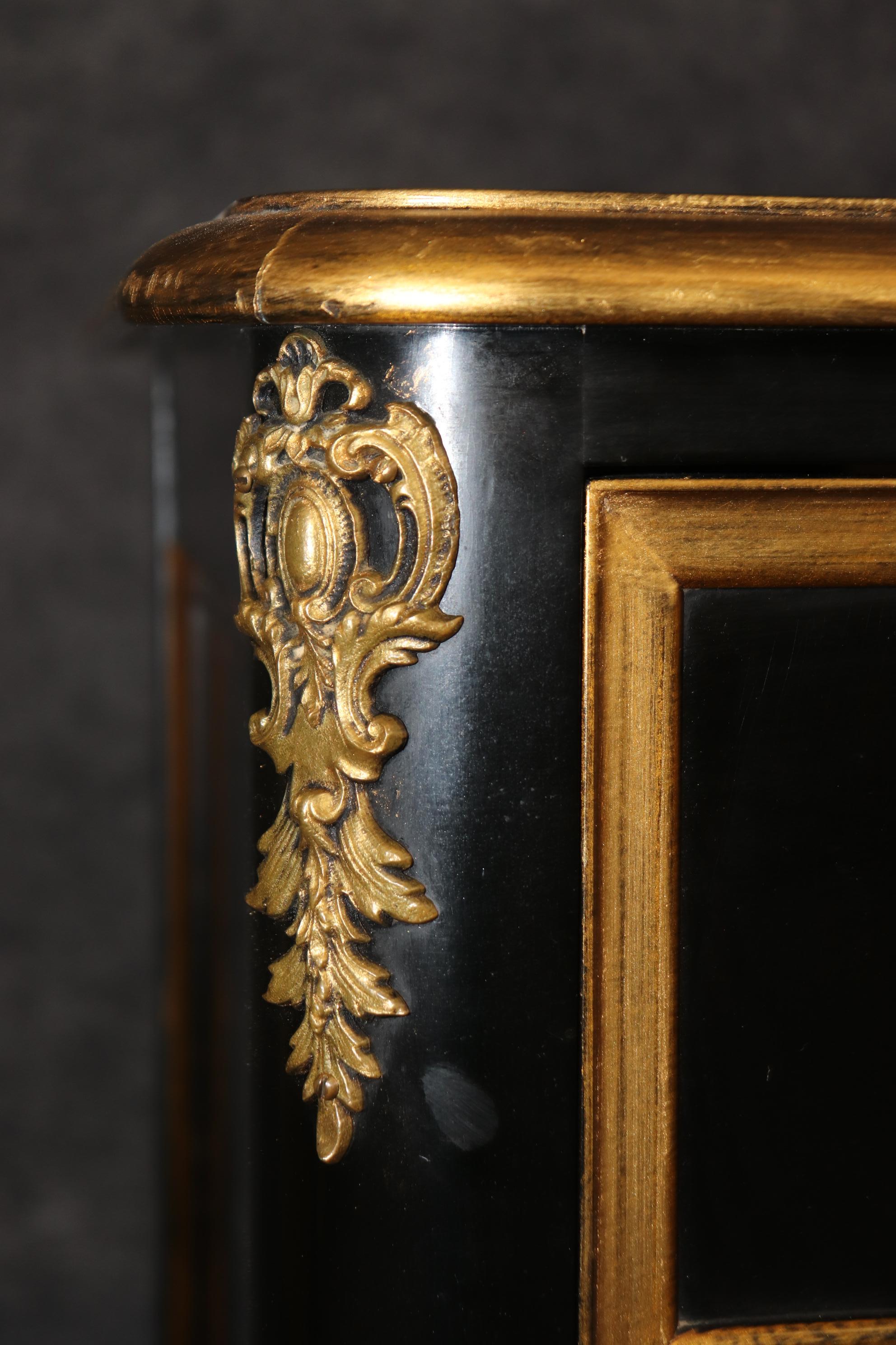 Matched Pair of Maison Jansen style Ebonized and Gilded Louis XV Commodes For Sale 4