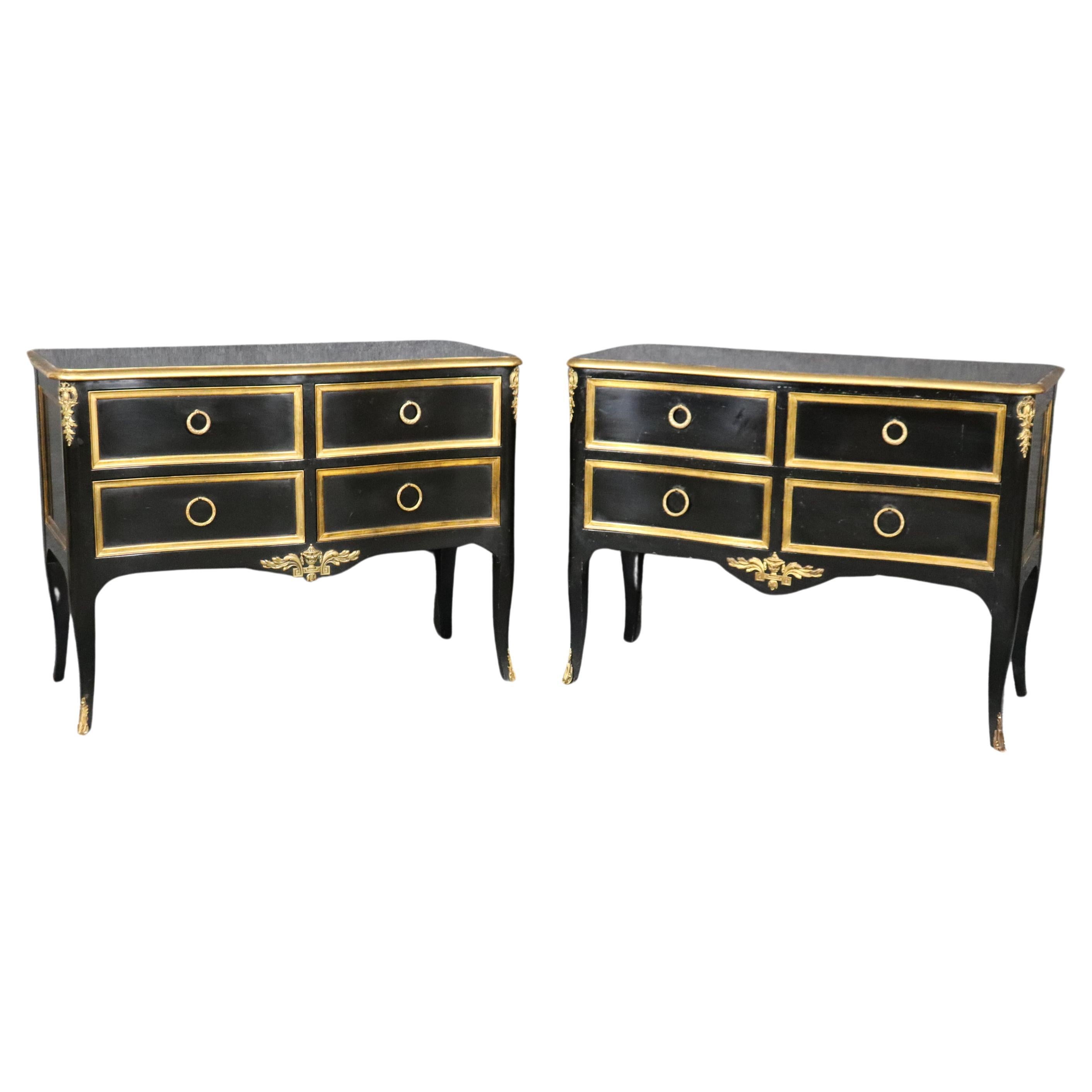 Matched Pair of Maison Jansen style Ebonized and Gilded Louis XV Commodes For Sale