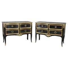 Matched Pair of Maison Jansen style Ebonized and Gilded Louis XV Commodes