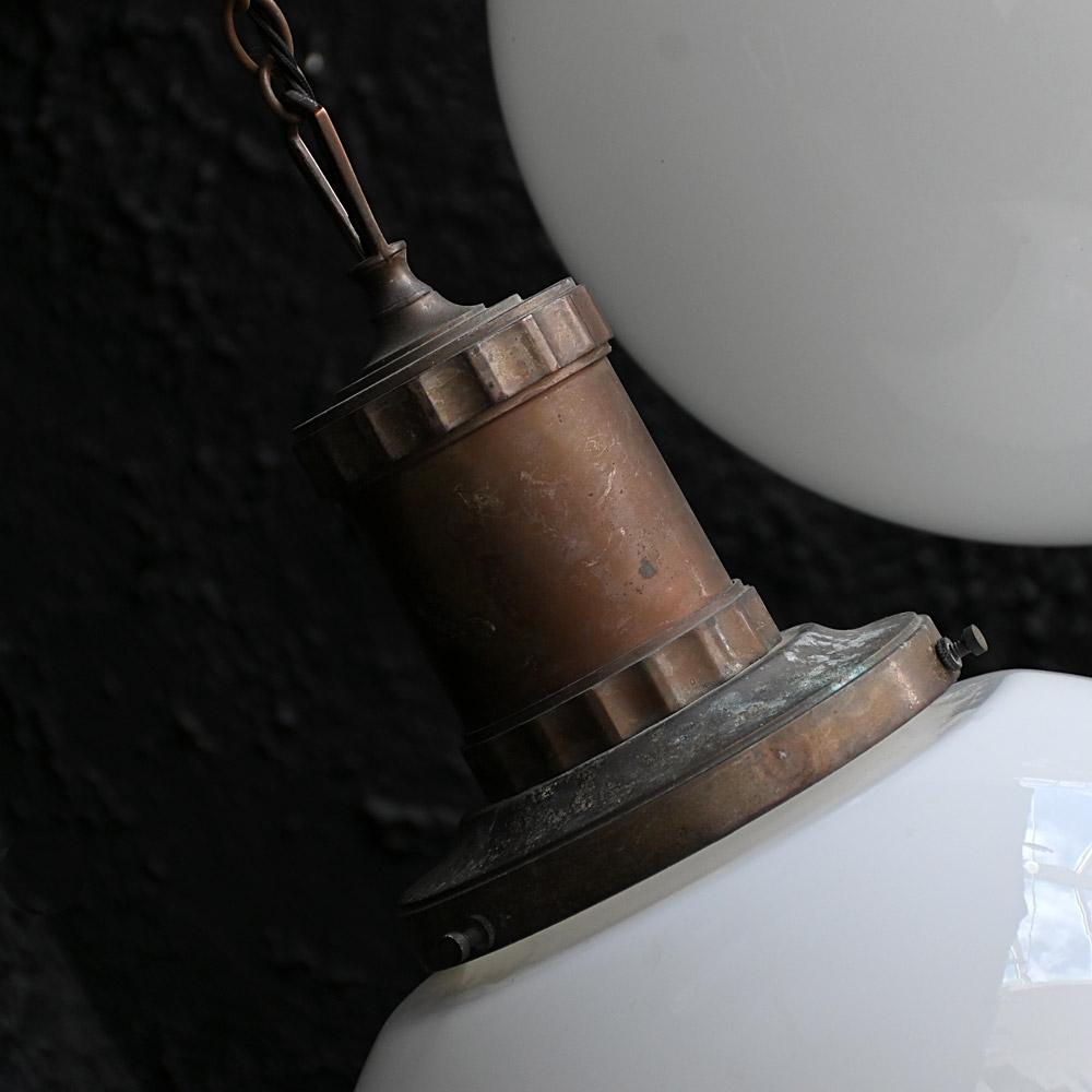 Matched Pair of Mid-20th Century Glass Morco Huge Opaline Pendants
 
A huge, matched pair of glass Morco opaline pendants with brass galleries and original hanging chains. The chains measure roughly 1 metre long, both lights are rewired and ready to