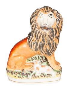 Matched Pair Of Staffordshire Pottery Lions