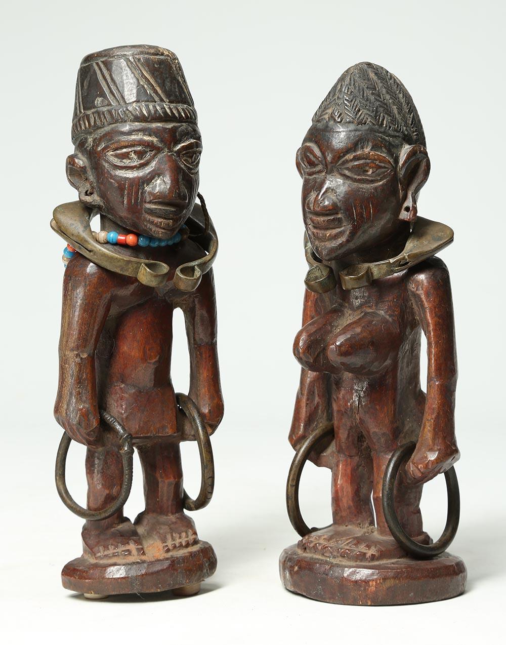 Matched pair of male and female Yoruba wood twin figures, 