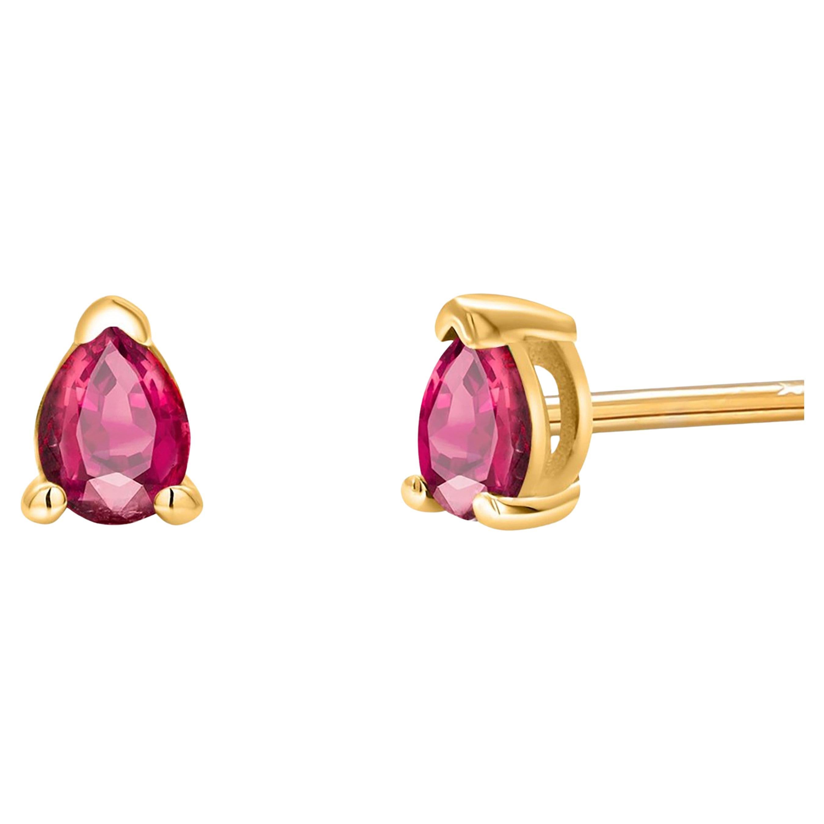 Matched Pair Pear Shaped Ruby 0.50 Carat Yellow Gold 0.20 Inch Stud Earrings For Sale