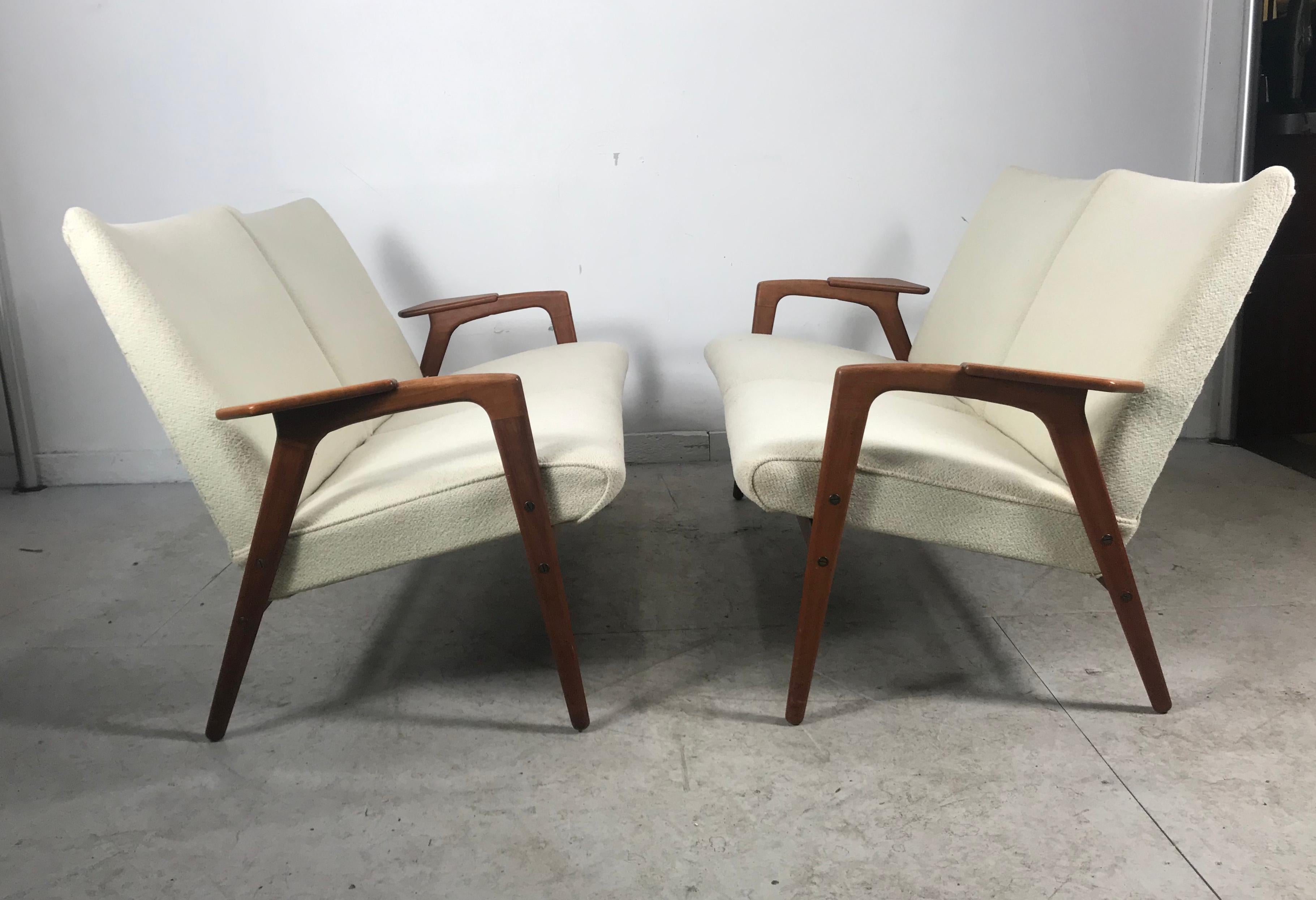 Stunning matched pair of settee's/loveseats designed by Yngve Extsrom for Pastoe 