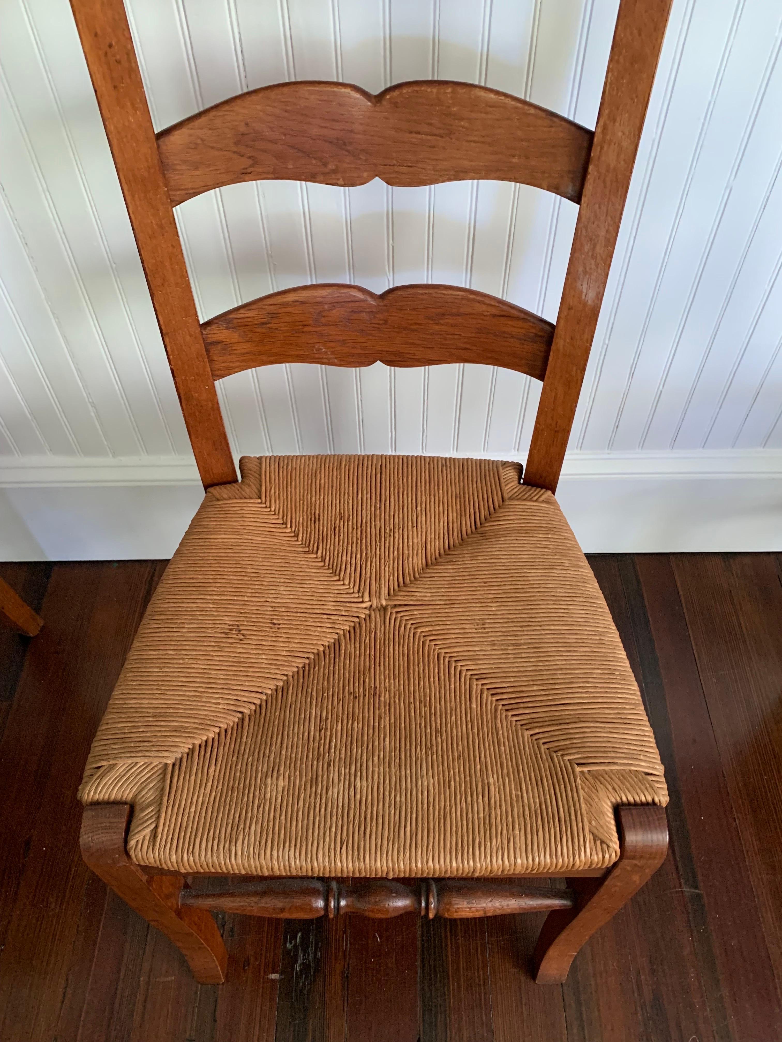 Matched Set of Four Oak Ladder Back Rush Dining Chairs In Good Condition In Southampton, NY