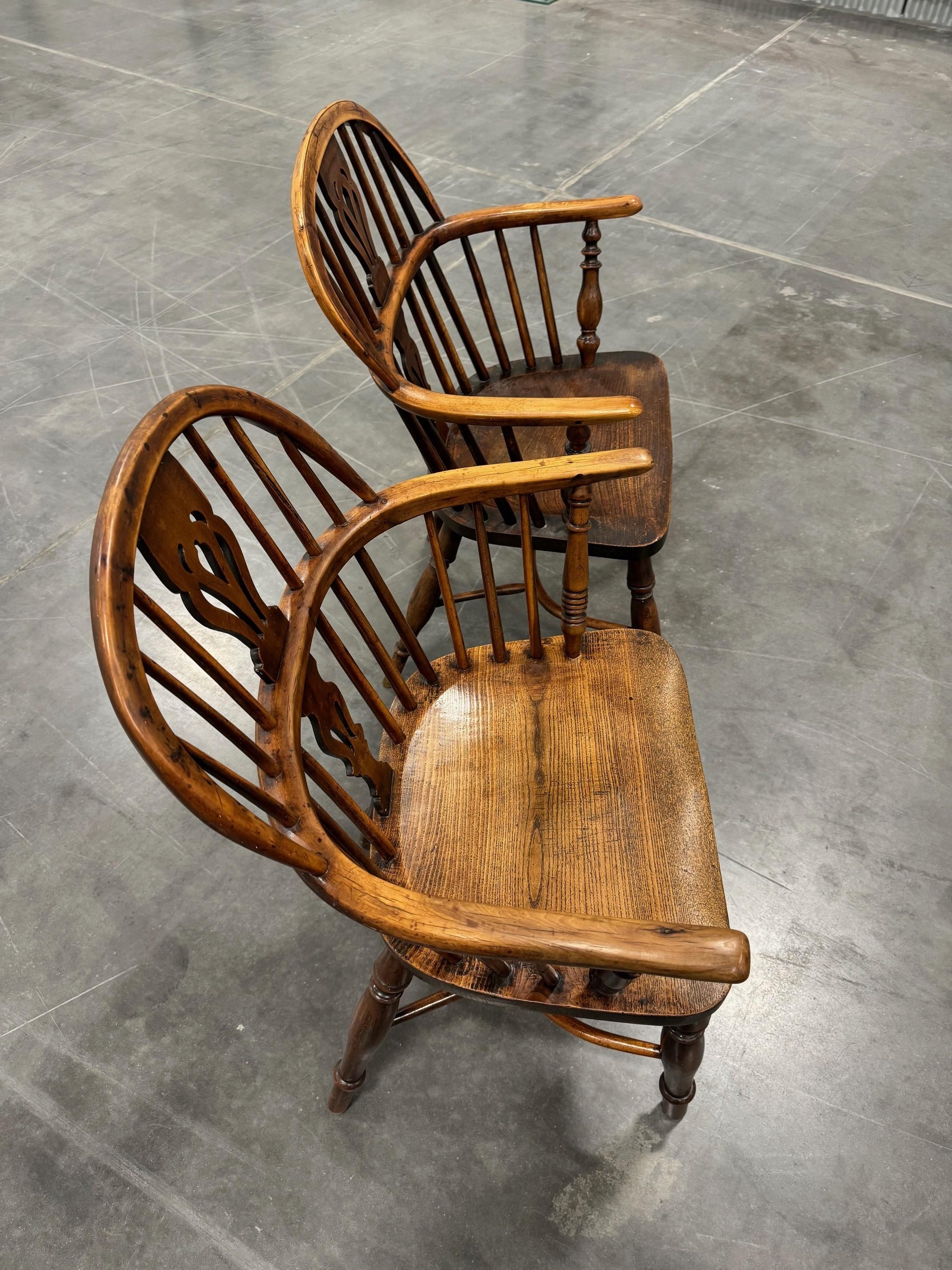 English Matched Set of Two Early Low back Yew Wood Windsor Chairs For Sale