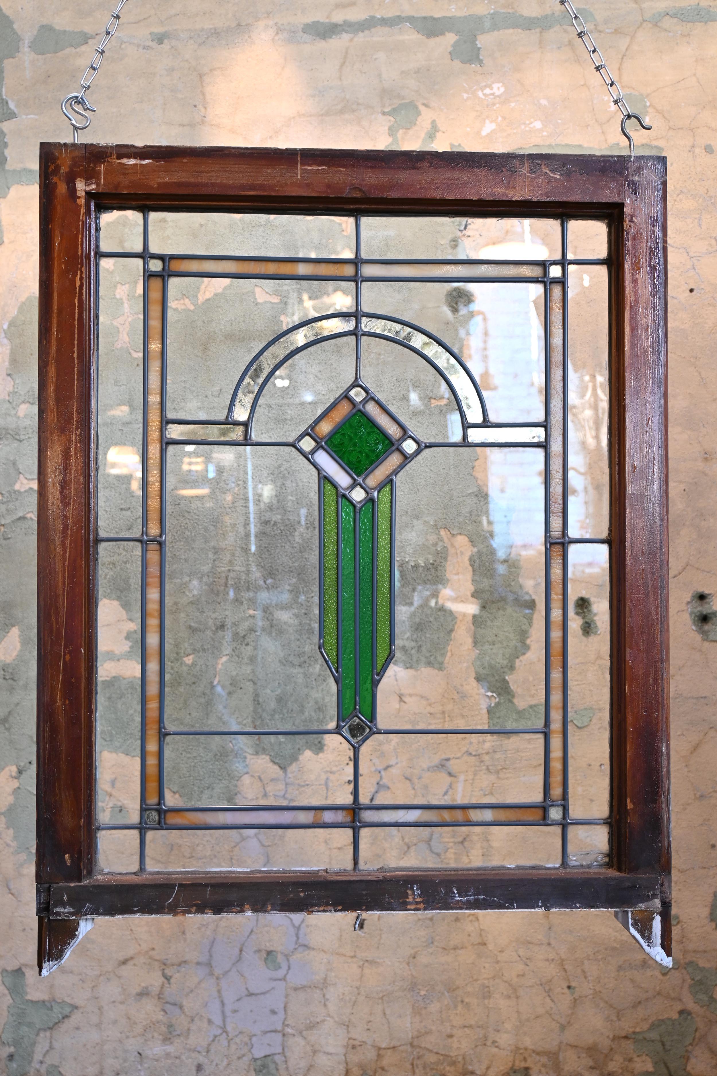 AA# 61035
13 of this size available
Stylized leaded glass called Bungalow or Prairie Glass windows brought their unique design of the geometric shapes, arches & flowers, with typical touch of color amidst clear glass they brought beauty in