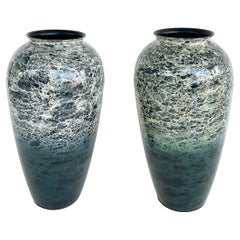 Matching Decorative Pair of Enameled Metal Vases