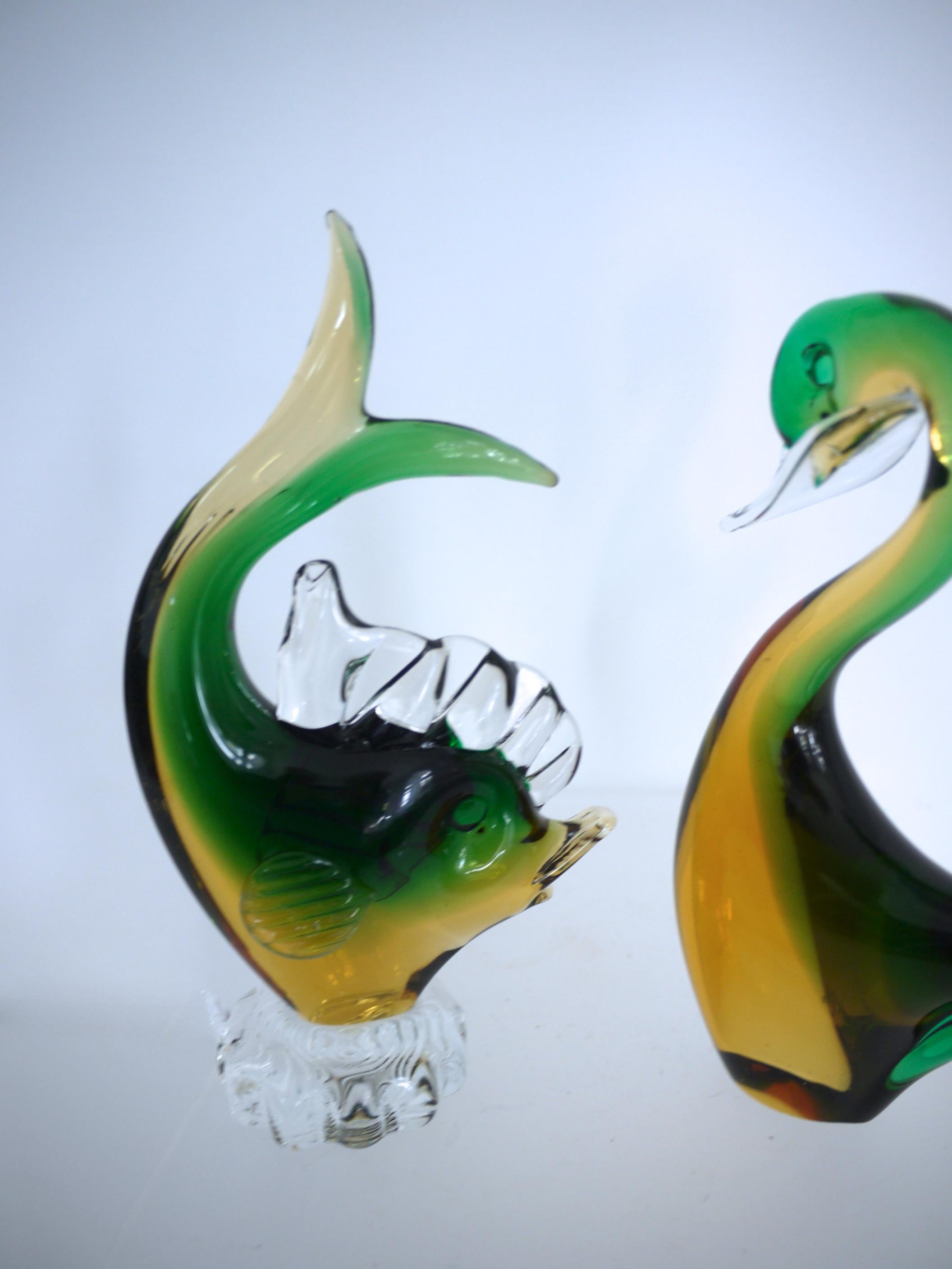 Matching Mid-Century Modern Art Glass Duck and Fish - in the style of Barbini mounted on glass pedestal.

Measures: Duck
Height 14 cms, width 11 cms
Weight 0.256 kgs

Fish
Height 15 cms
Width 8 cms (at widest)
Weight 0.278 kgs.

  