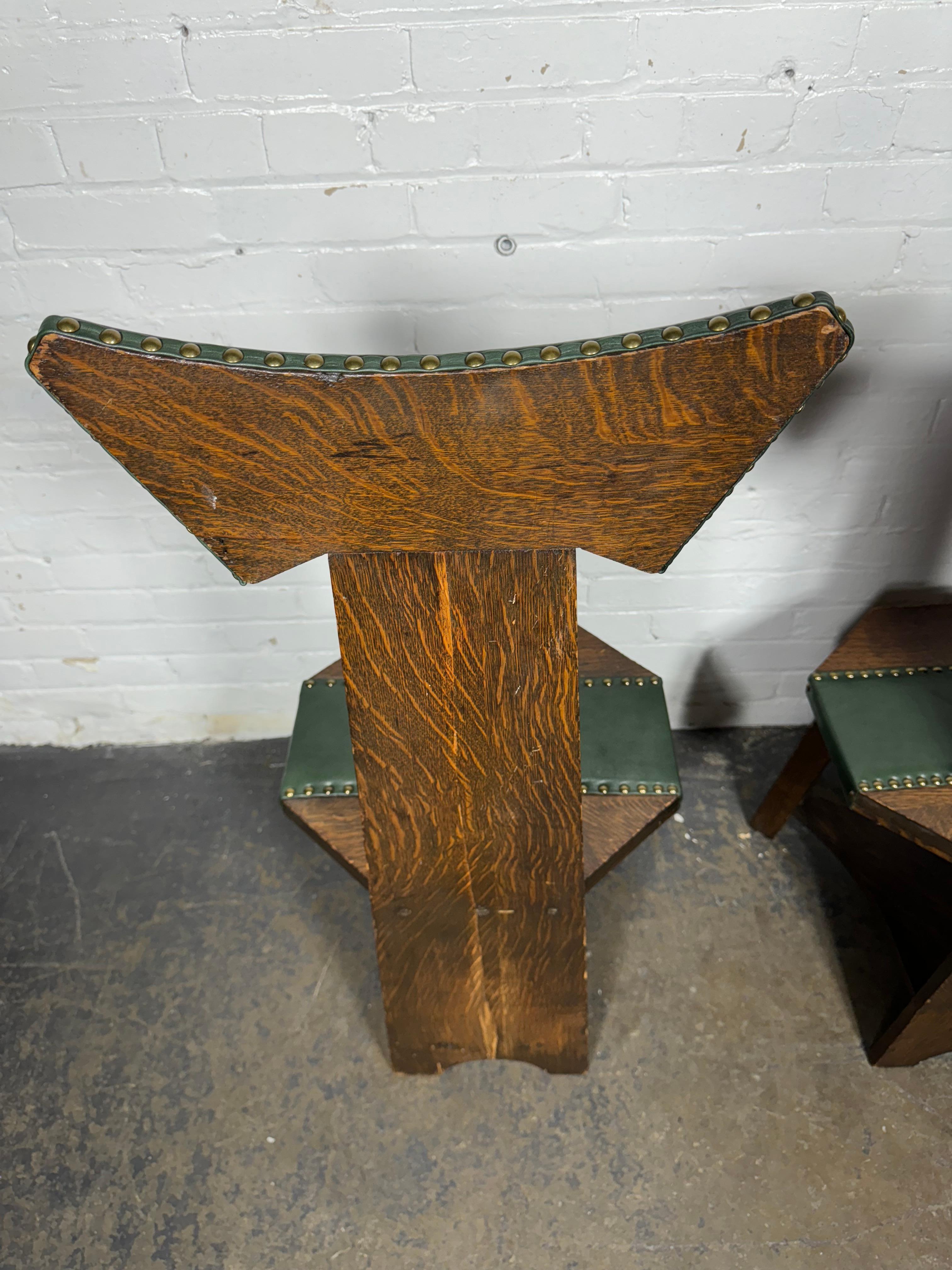 American Matching pair Barber Brothers oak and leather hall chairs. 1905 Arts & Crafts