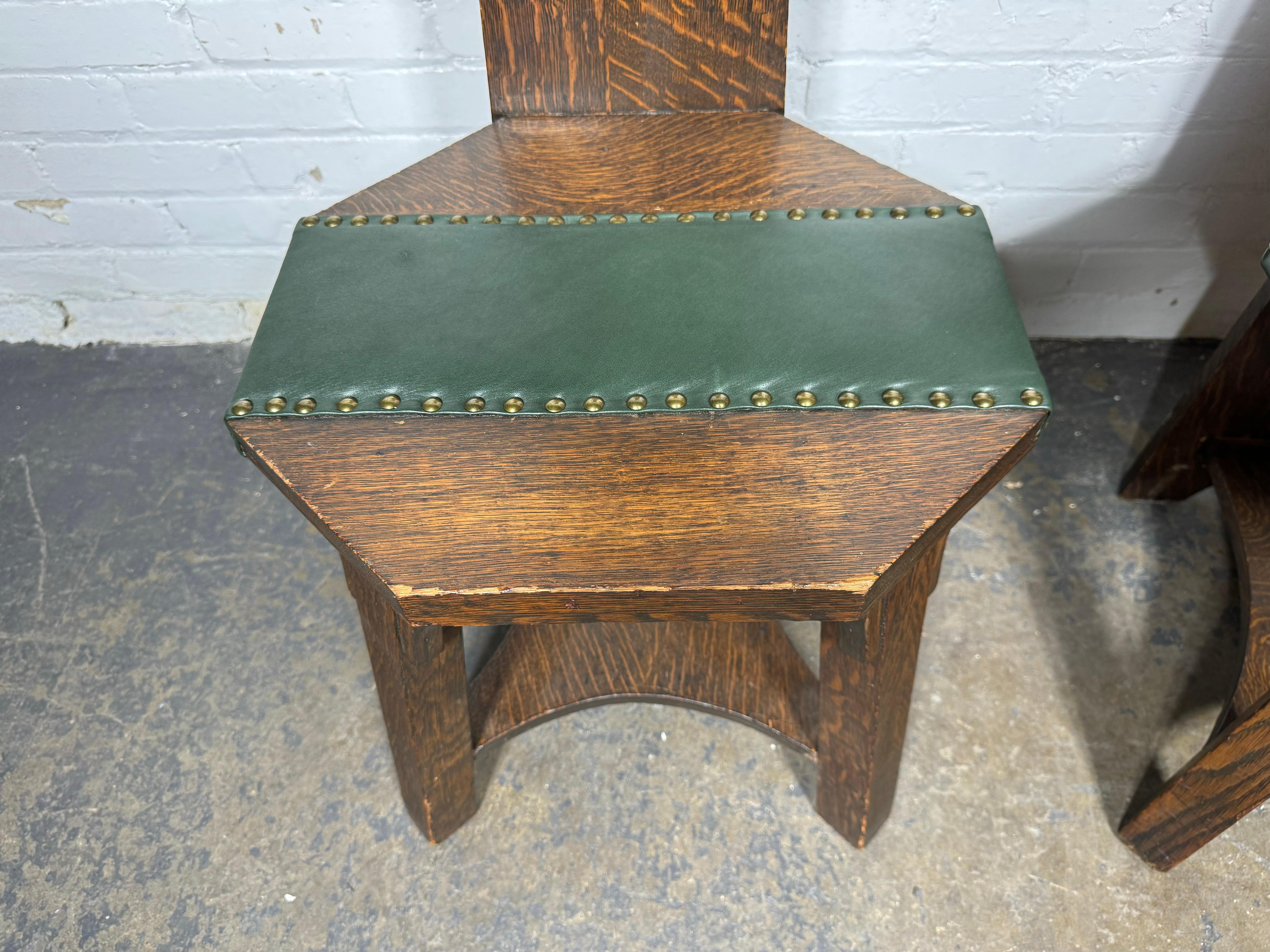 Matching pair Barber Brothers oak and leather hall chairs. 1905 Arts & Crafts In Good Condition In Buffalo, NY