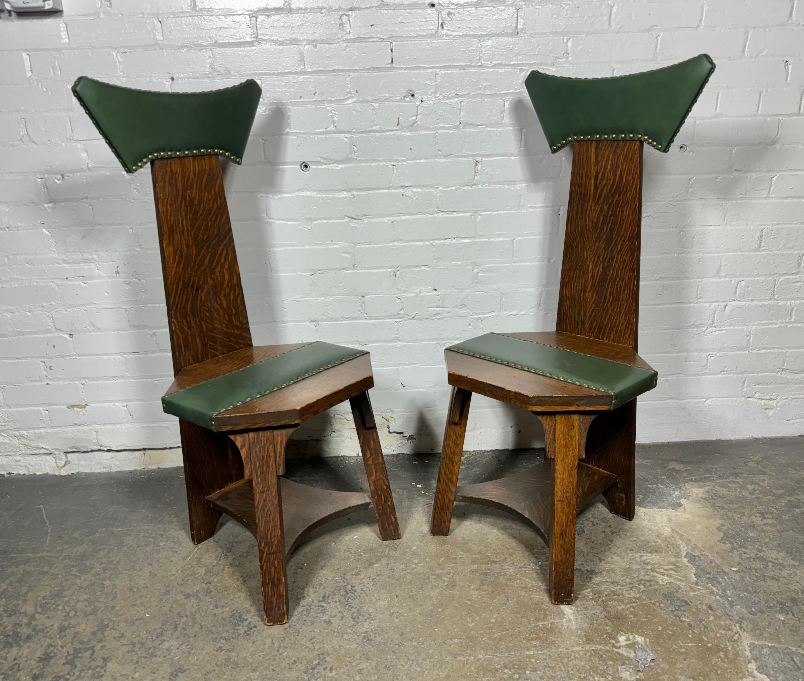 Early 20th Century Matching pair Barber Brothers oak and leather hall chairs. 1905 Arts & Crafts