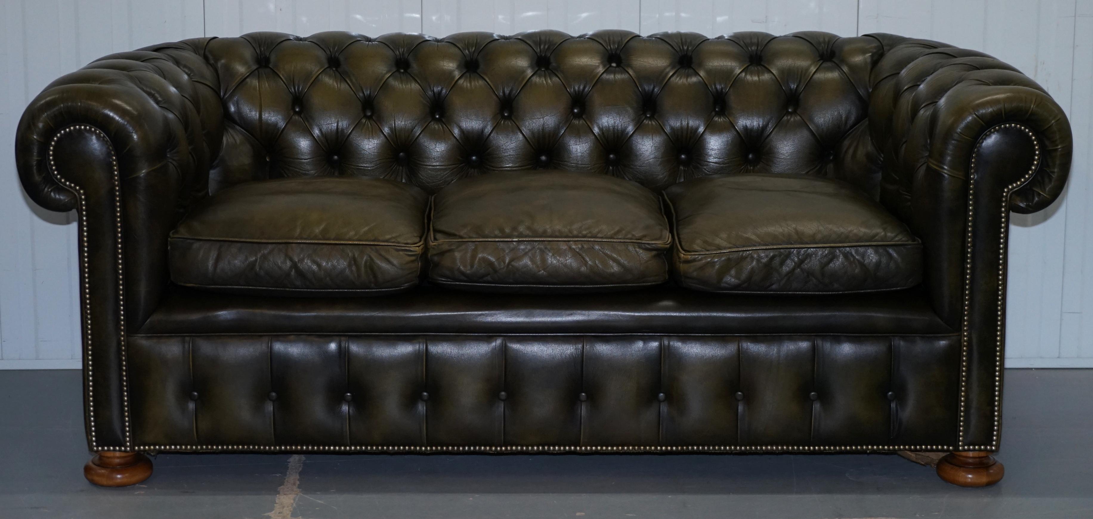We are delighted to offer for sale this stunning pair of exceptional 1950s hand dyed Luxury Chesterfield club sofas with feather filled cushions and a coil sprung base.

It's very rare to find a matching pair of these and especially in this