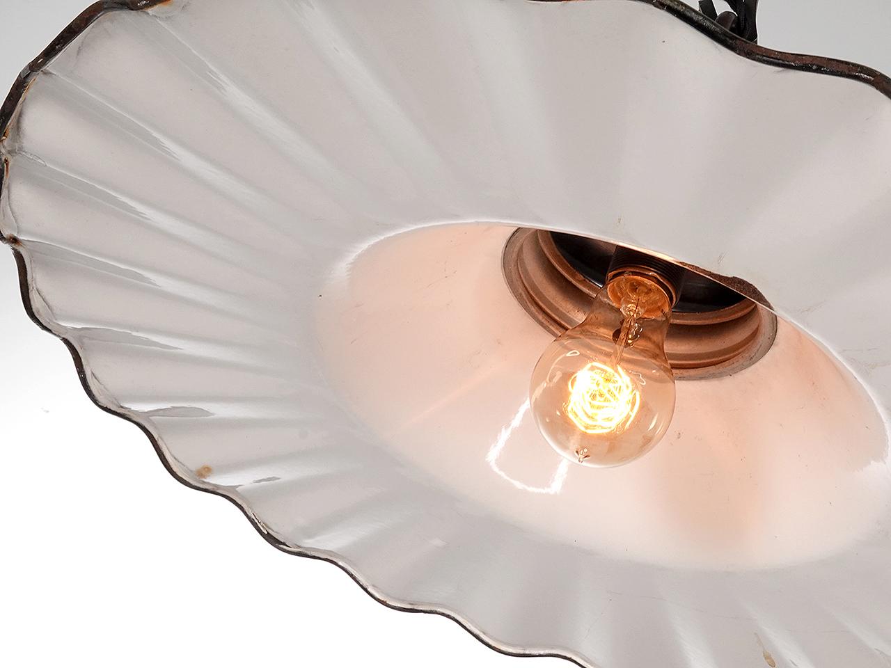 These are early Philadelphia street lamps. They have an impressive 20 Inch diameter and are 10 inches tall. The porcelain shade is nice and straight with some age spots here and there. We decided to fit the shades to a nicer low profile holder. It