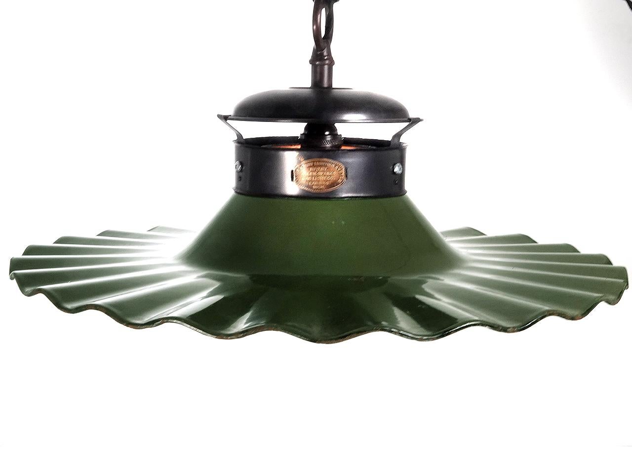 Industrial Matching Pair of 20 Inch Radial Wave Porcelain Pendents For Sale