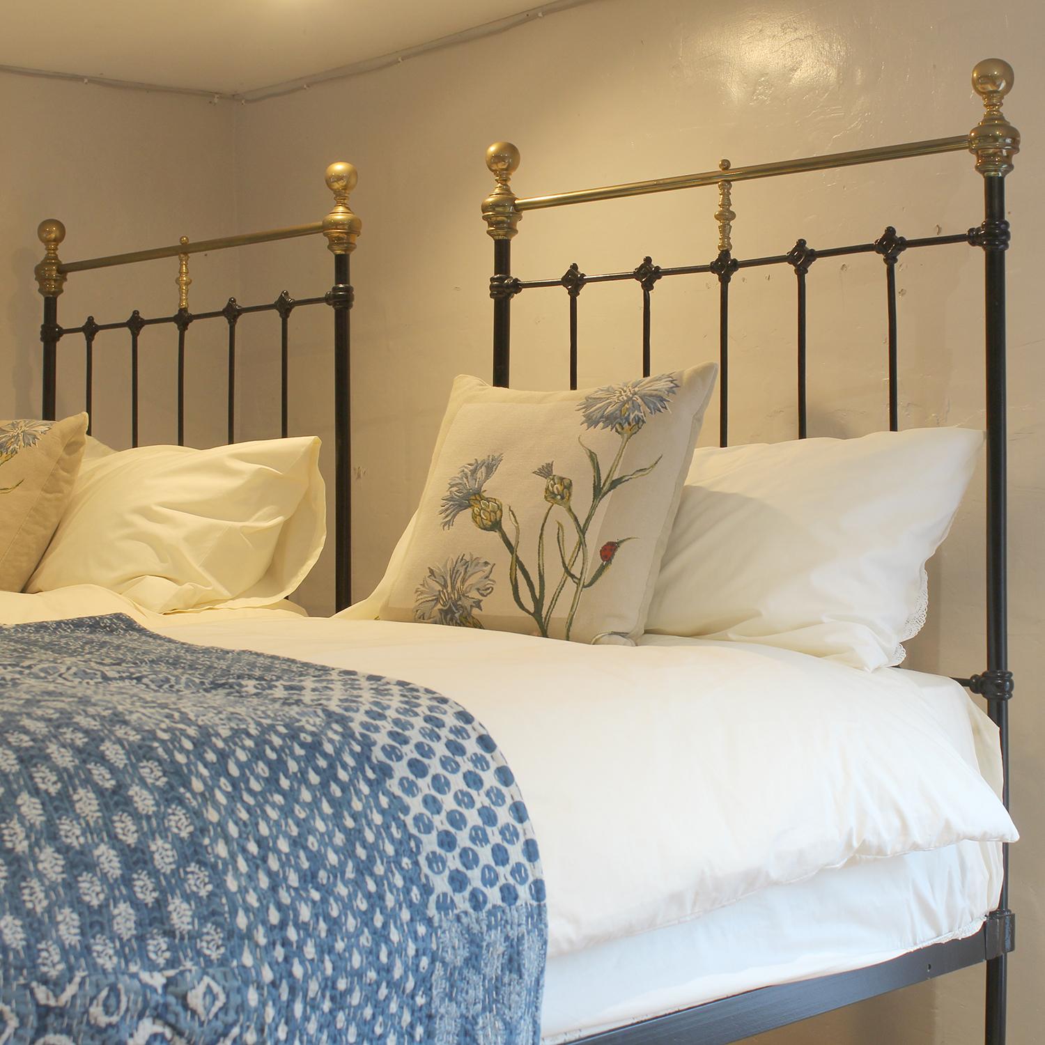 Steel Matching Pair of Antique Cast Iron Antique Beds in Black MP67 For Sale