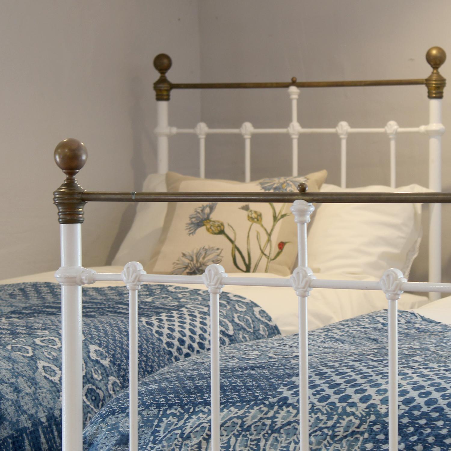 English Matching Pair of Antique Cast Iron Antique Beds in White MP68 For Sale