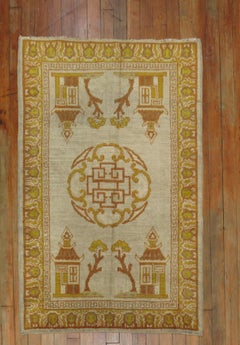 Matching Pair of Antique Khotan Rugs