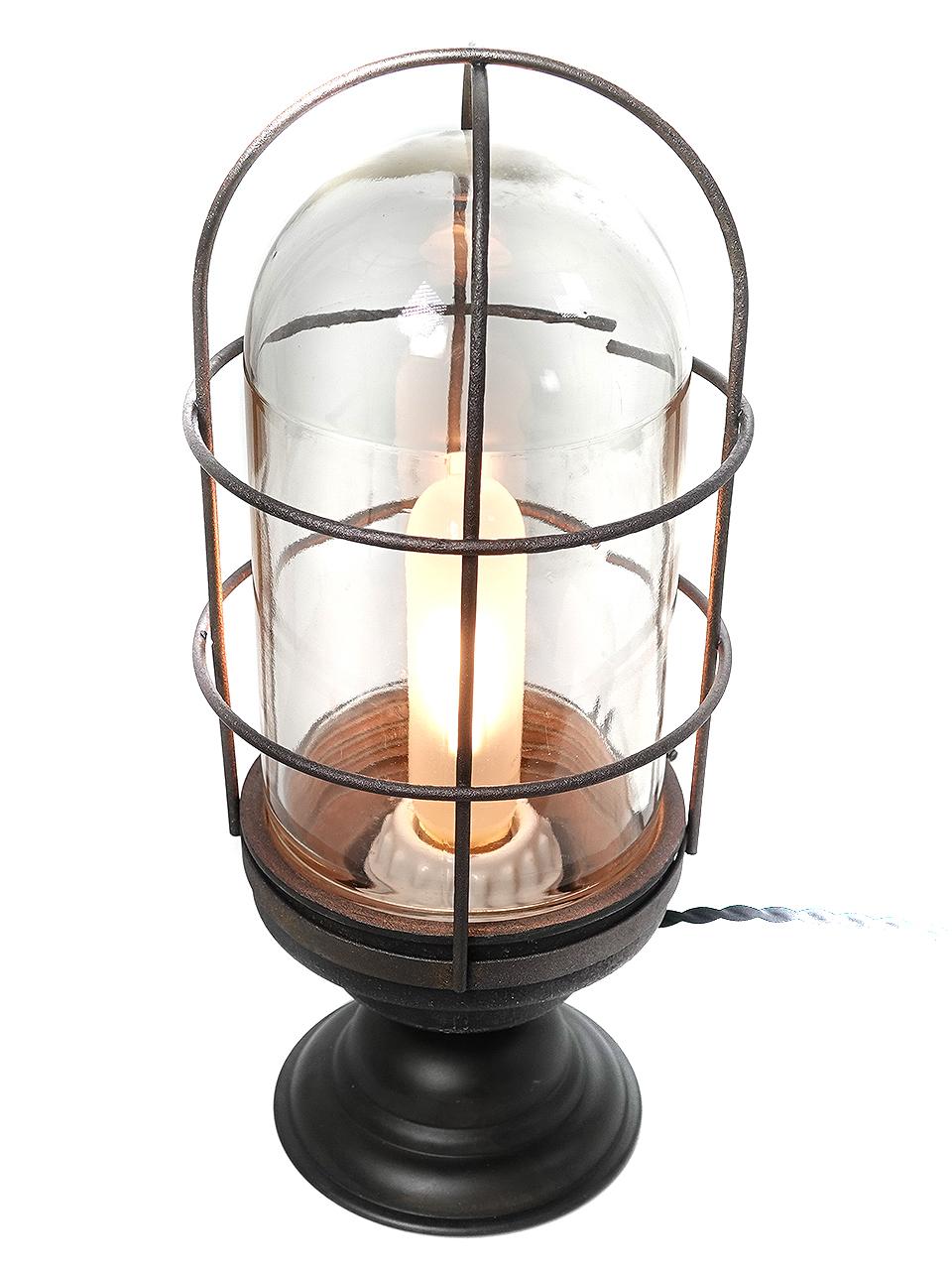 I see this pair as quintessential industrial table lighting. Originally they were the simplest of explosion proof fixtures. Now on a standing base, rewired with twisted fabric covered cord and wall plug they take on a whole new look. Priced and sold