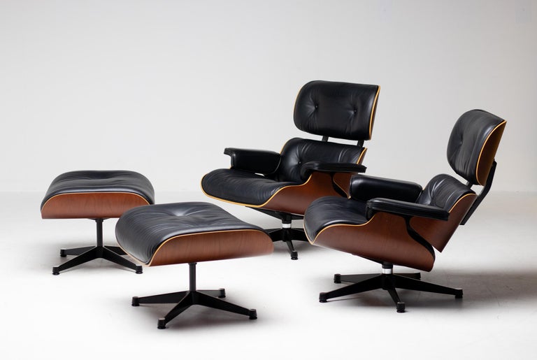 Matching Pair of Charles and Ray Eames 670/671 Lounge Chairs and