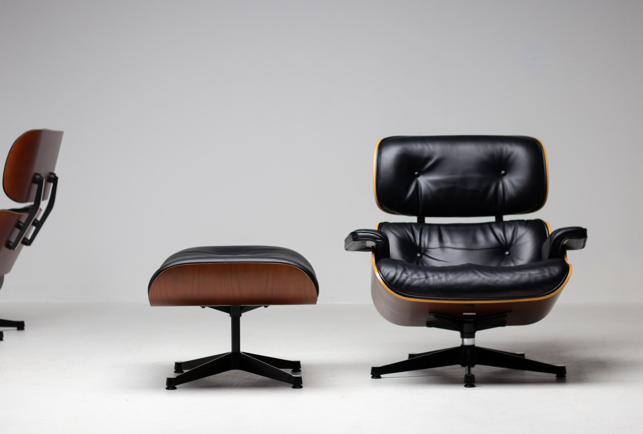 Contemporary Matching Pair of Charles & Ray Eames 670/671 Lounge Chairs and Ottomans